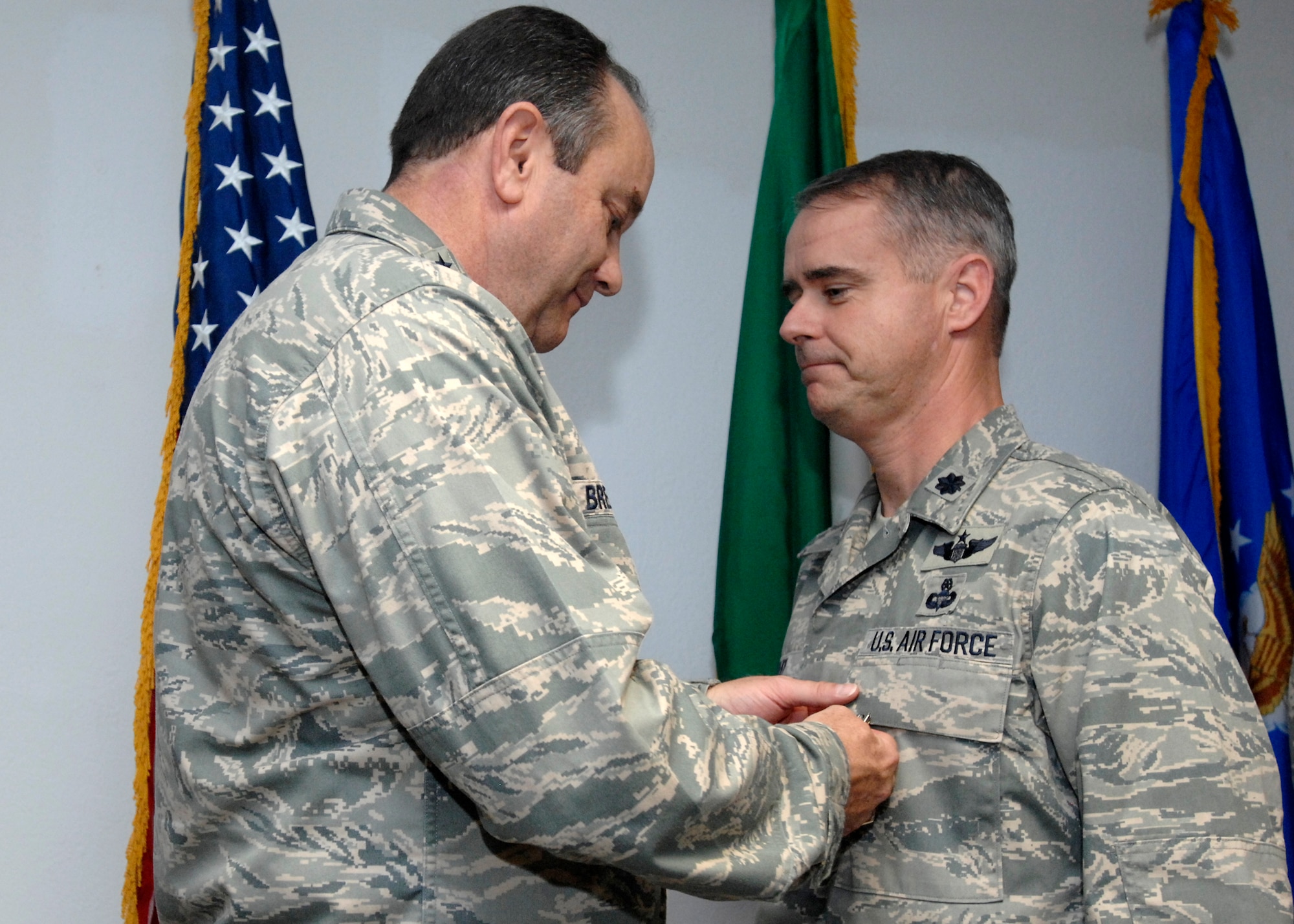 Lt. Col. Matthew Foley, 8th Air Support Operations Squadron commander, was presented the Air Force Combat Action Medal by Lt. Gen. Philip Breedlove for his actions as an air liaison officer while deployed with the Army in Afghanistan. General Breedlove is the 3rd Air Force commander and a former wing commander of the 31st Fighter Wing presented the medal during his visit to Aviano Air Base Oct. 16, 2008. (U.S. Air Force photo/Airman 1st Class Ashley Wood)