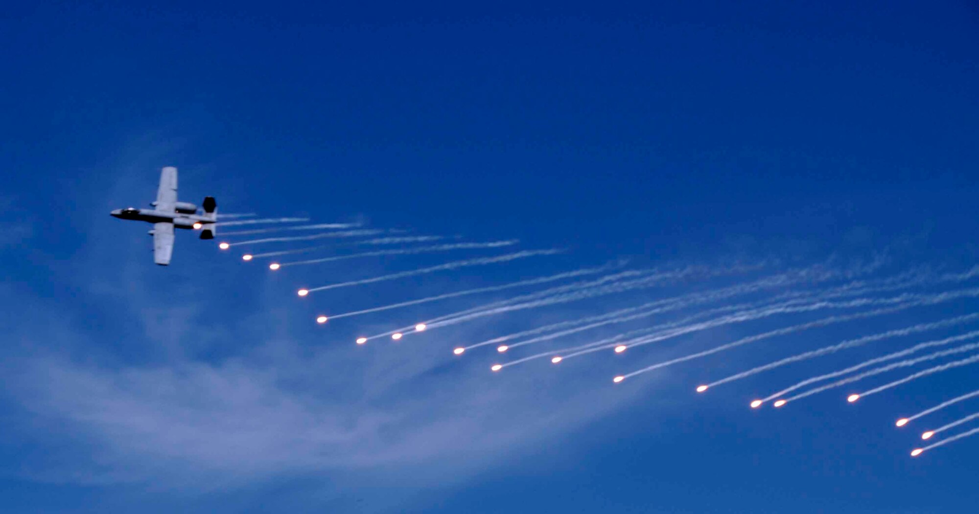 OSAN AIR BASE, Republic of Korea -- The A-10 “Thunderbolt II” shoots flares during an Air Power Day 2008 aerial demonstration. The event also featured aerial demonstrations of the F-16 “Fighting Falcon,” U-2 “Dragon Lady,” the ROKAF F-4 “Phantom” and TA-50 “Golden Eagle.” (U.S. Air Force photo/Staff Sgt. Candy Knight)