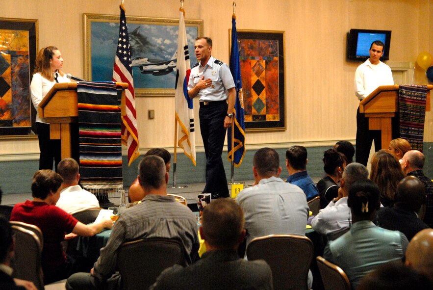 Col. Bryan Bearden, 8th Fighter Wing commander speaks to the croud at the Hispanic Heritage Dinner, Kunsan Air Base, Oct. 10. (U.S. Air Force photo/Staff Sgt. Jason Colbert)