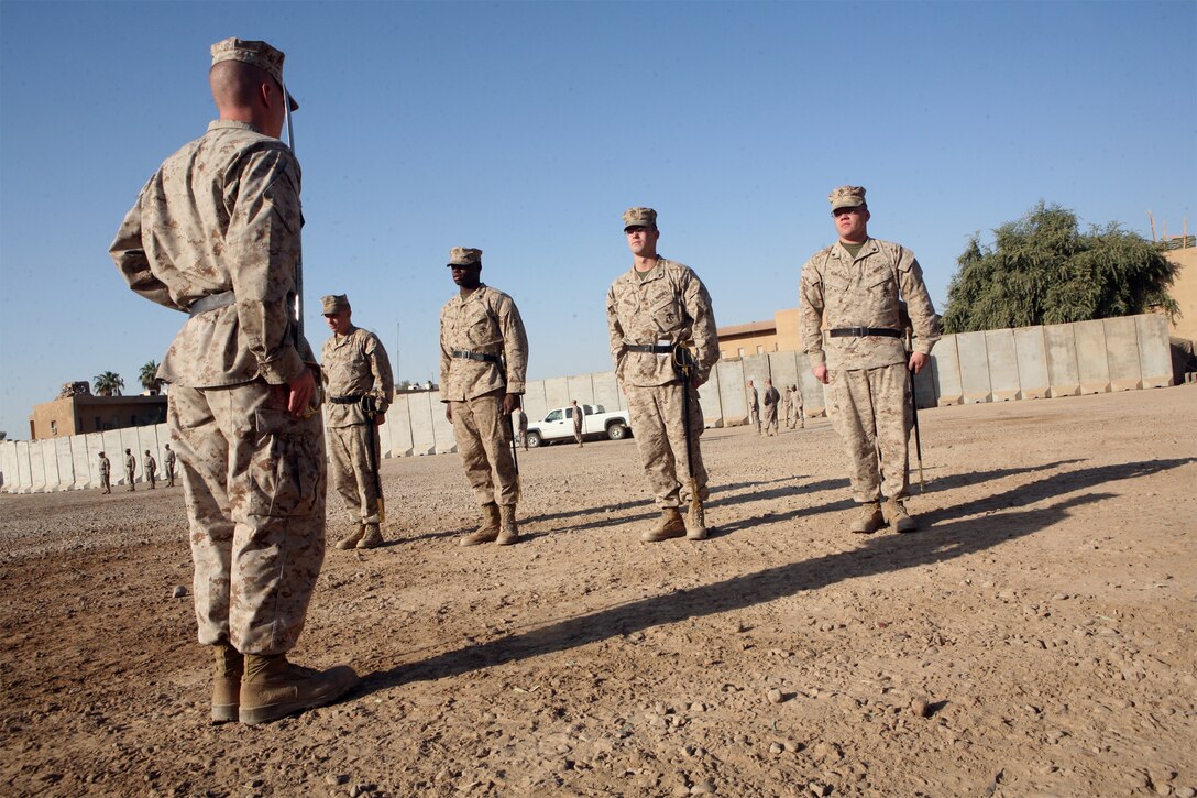 Marines with Task Force 1st Battalion, 2nd Marine Regiment, Regimental Combat Team 1, learn how to drill a squad-sized formation during a two-week Corporals Leadership Course Oct. 10 through 24. “The course was well rounded,” said Cpl. James Thesing, a 22-year-old electro-optical ordinance repairman with Headquarters and Service Company. “It’s a course that teaches the foundation of leadership to new leaders.”