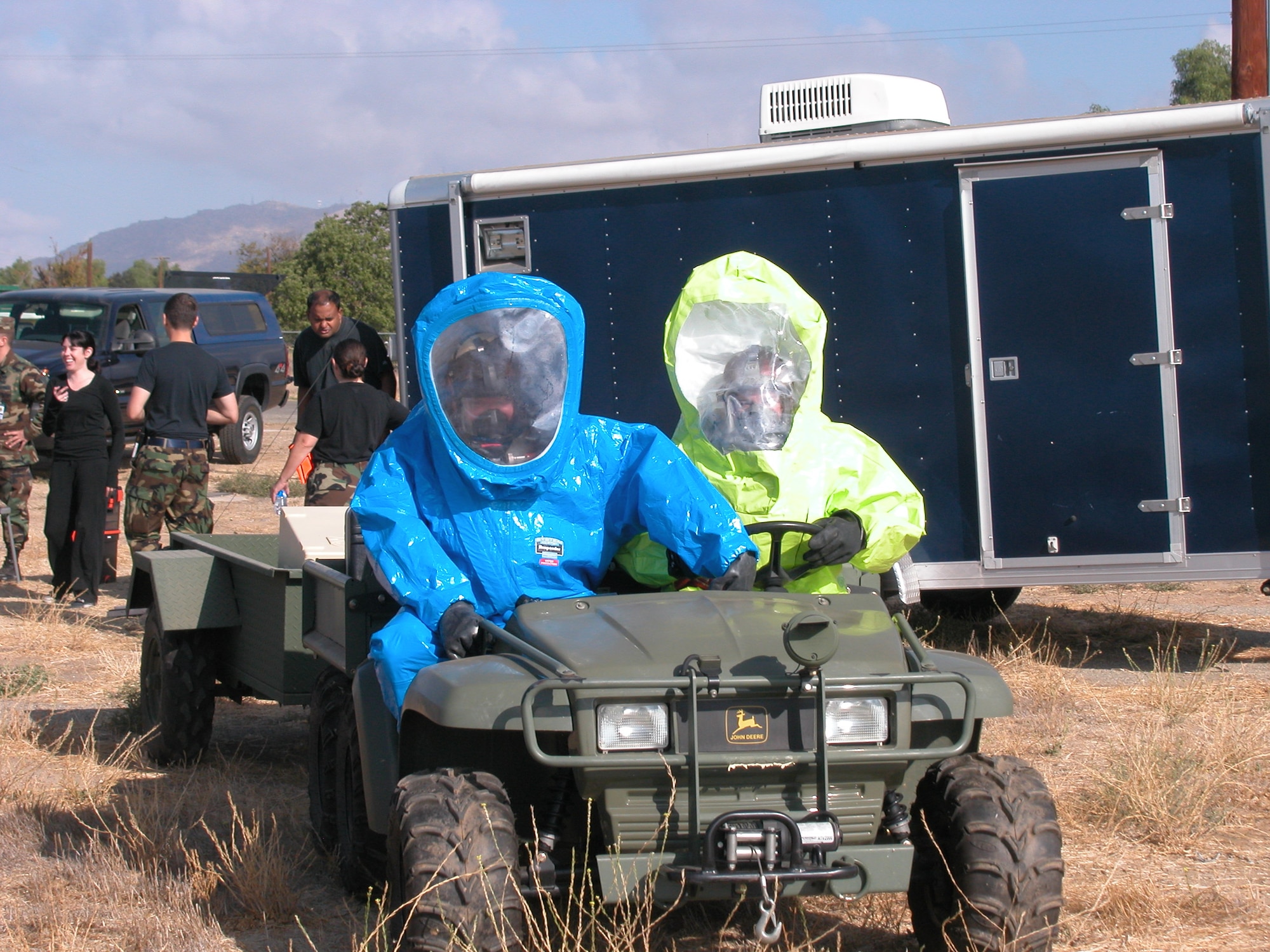 Master Sgt. Marc Haraksin, 163 RW (left) and Senior Airman Chris Valenzano, 163 EM Flight, drive to the suspected lab site to test the perimeter and establish proper zones for the off-scene command section. (U.S Air Force photo by Senior Airman Kara McGrath)