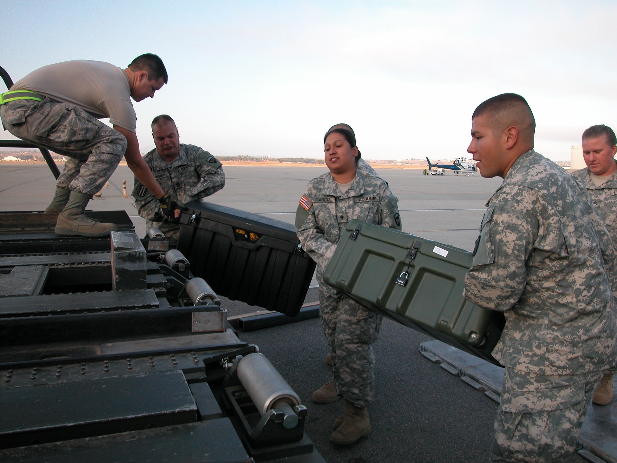 Members of the Army National Guard’s 304th Sustainment Brigade load equipment on a K-loader to prepare for their unit’s deployment to Iraq. In all, they loaded about 36,500 pounds of cargo and personal equipment. After leaving March ARB, they flew to Fort Bliss, Texas where they will train for six weeks before heading to Iraq. According to 452 APSF, 34,000 people (approximately 22 million pounds) and about 56 million pounds of cargo are processed from March ARB each year. (U.S. Air Force photo by Staff. Sgt. Joe Davidson)