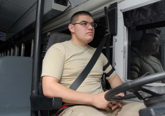 SOUTHWEST ASIA -- Airman 1st Class Stephen Lucero spends part of the long desert night waiting to provide transportation to about 25 E-3 Sentry air crew members here Oct. 7. Airman Lucero, deployed from Yakota AB, Japan, is a vehicle operator with the 380th Expeditionary Logistics Readiness Squadron. (U.S. Air Force photo by Tech. Sgt. Denise Johnson) (released)