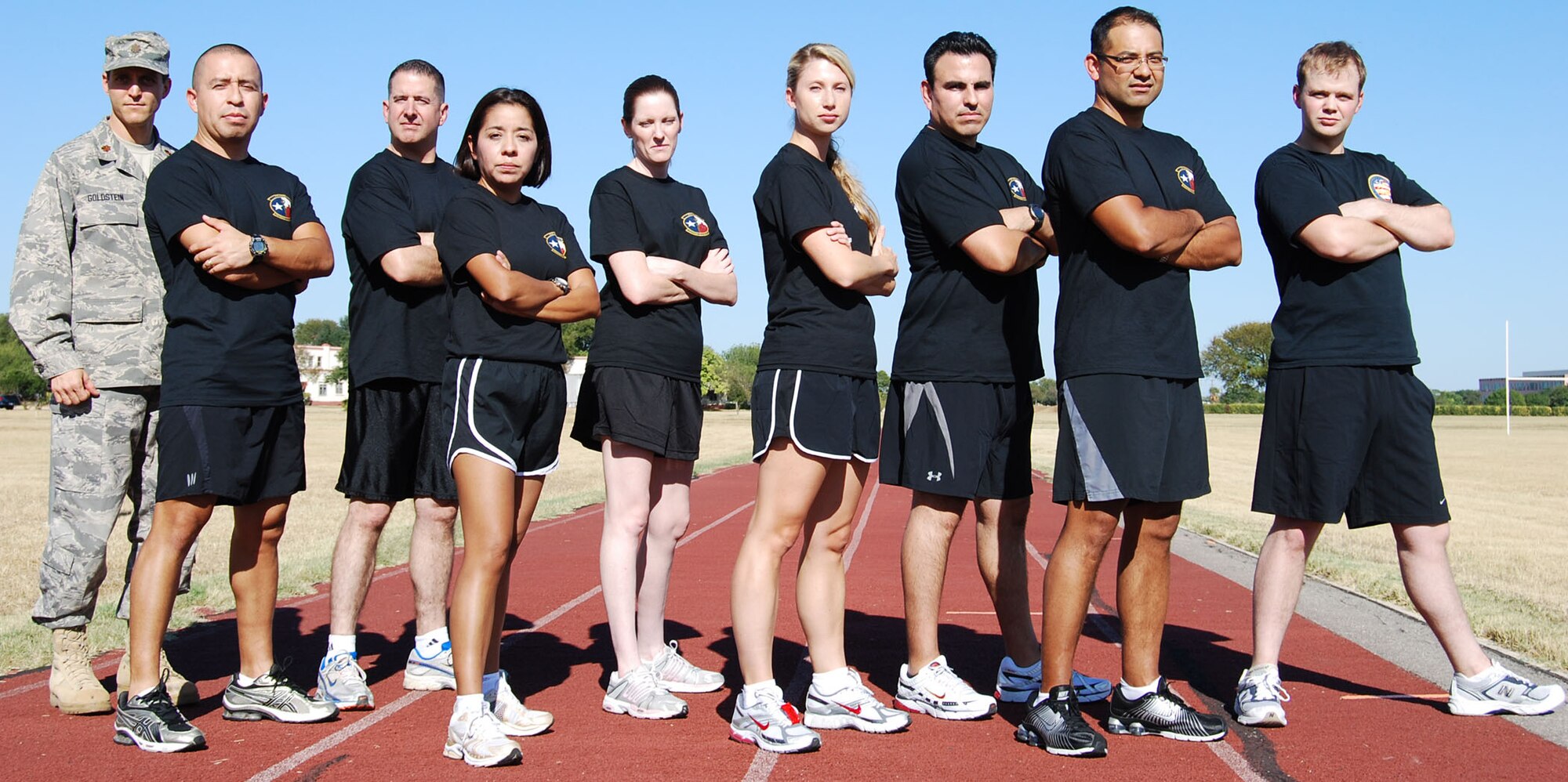 Members from the 433rd Air Medical Staging Squadron keep each other motivated as they train in preperation for the 2008 Inagural San Antonio Rock 'n' Roll Marathon.