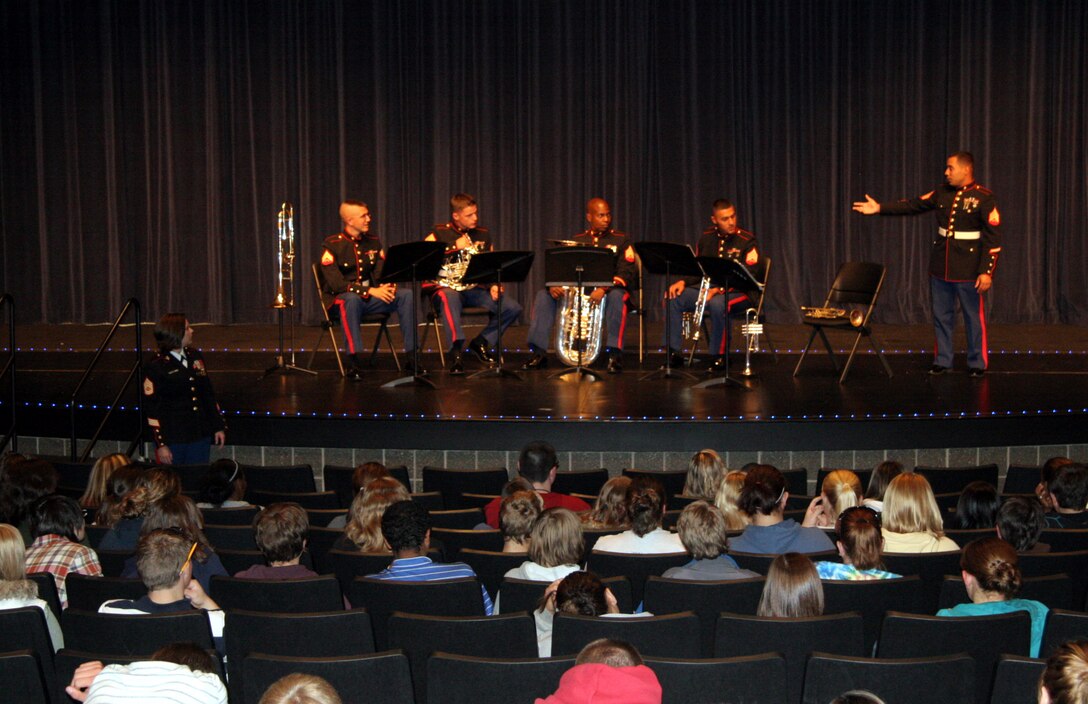 Members of the Brass Quintet from the Marine Corps Air Ground Combat Center Twentynine Palms, Calif., perform at Orchard View High School, Muskegon, Mich. Oct. 20, 2008. The Quintet went on a five-day tour of Recruiting Station Lansing Oct. 20-24, performing for the public and offering clinics for the students.