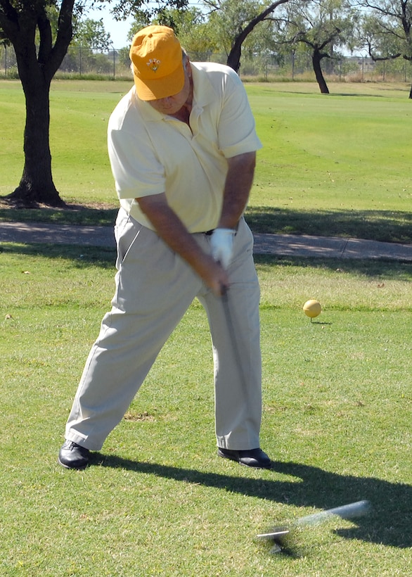 Jodi Walker, a tournament participant, tees off at the 12th hole at the Wind Creek Golf Course 50th Anniversary Tournament Oct. 17. Thirty-eight teams participated in the four man scramble. (U.S. Air Force photo/Lou Anne Sledge)