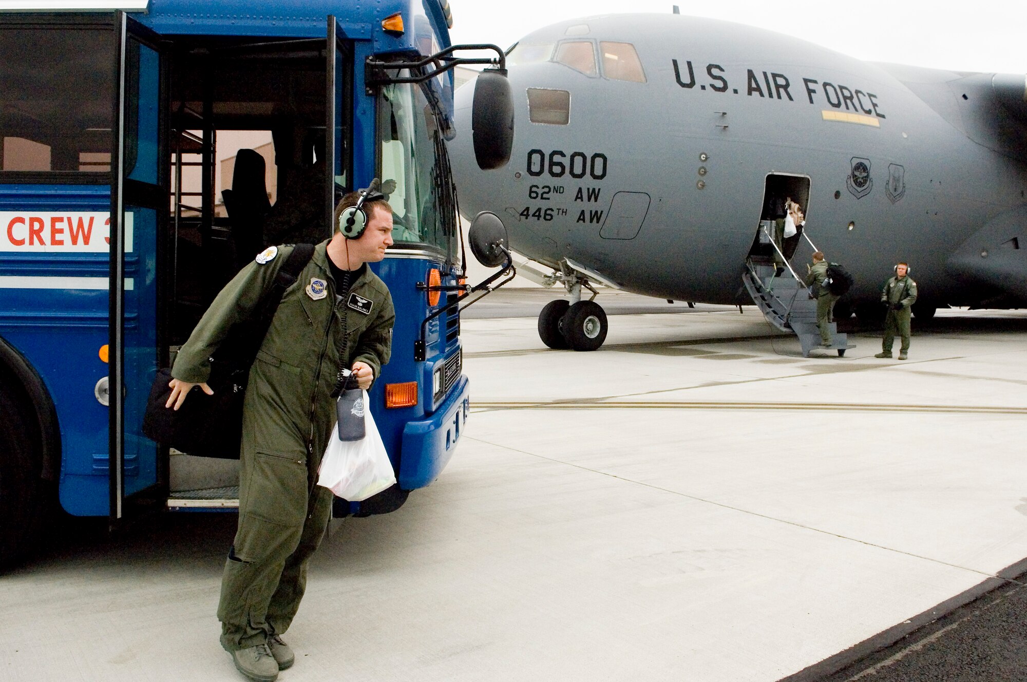 Capt. Shaun Maloney, 8th AS, steps off the bus and makes his way to the aircraft for an Oct. 16 training flight. (U.S. Air Force photo/Abner Guzman)
