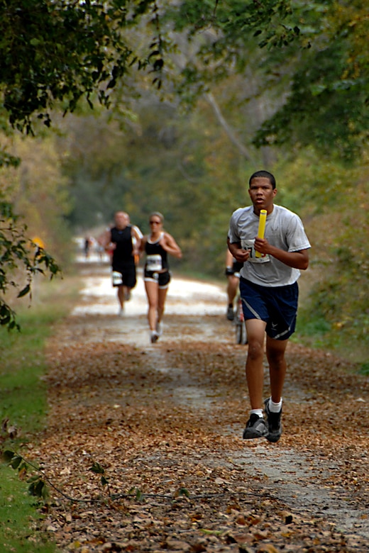 Senior Airman Chris Patton, supply management technician with the Air Force Reserve’s 610th Intelligence Flight, runs for a five mile stretch Oct. 11 on one of the trails in rural Nebraska during the Market to Market Relay race from downtown Omaha to downtown Lincoln. The race was the first of its kind consisting of 150 teams of six to eight people and covered 86 miles. (U.S. Air Force Photo Courtesy of 55th Wing Public Affairs)