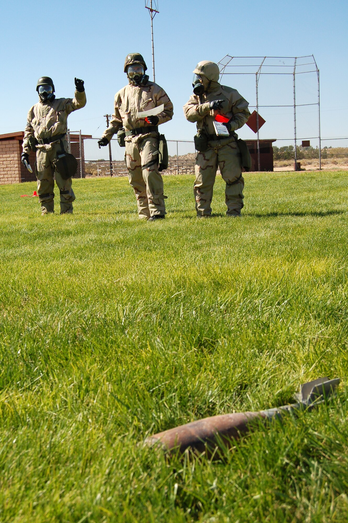 Edwards Airmen identify an unexploded ordnance during a Phase II exercise at Arnold Park in preparation for a Unit Compliance Inspection in January. (Air Force photo by Senior Airman Julius Delos Reyes)