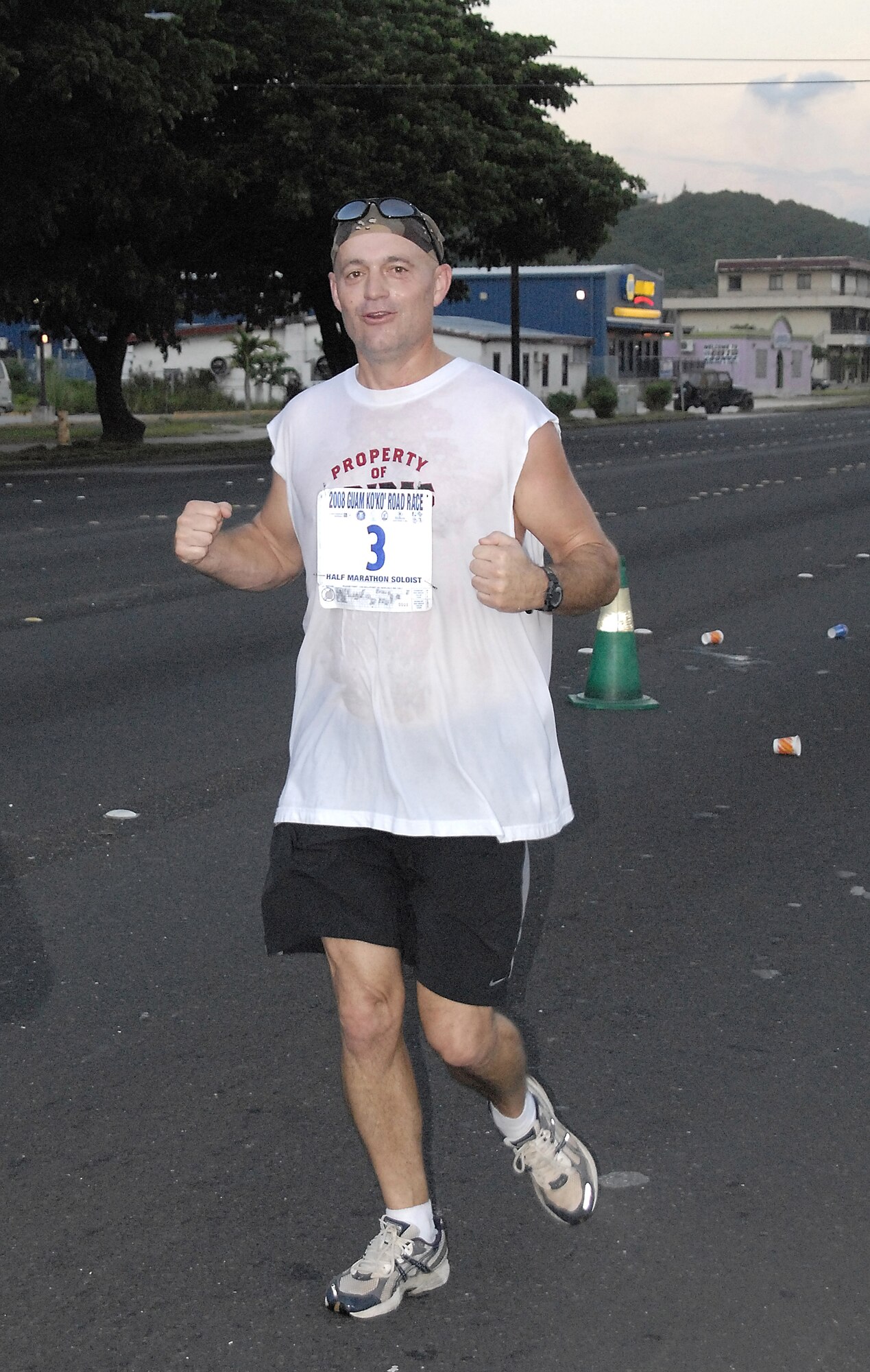 ANDERSEN AIR FORCE BASE, Guam-- Chief Master Sgt. Craig Recker of the 36th Contingency Response Group proves he is fit to fight during the Guam Ko'ko' Road Race Oct. 19. The race was designed to improve the numbers and the quality of life of the Guam Ko'ko Bird. (U.S. Air Force photo by Master Sgt. Lisa M. Zunzanyika)