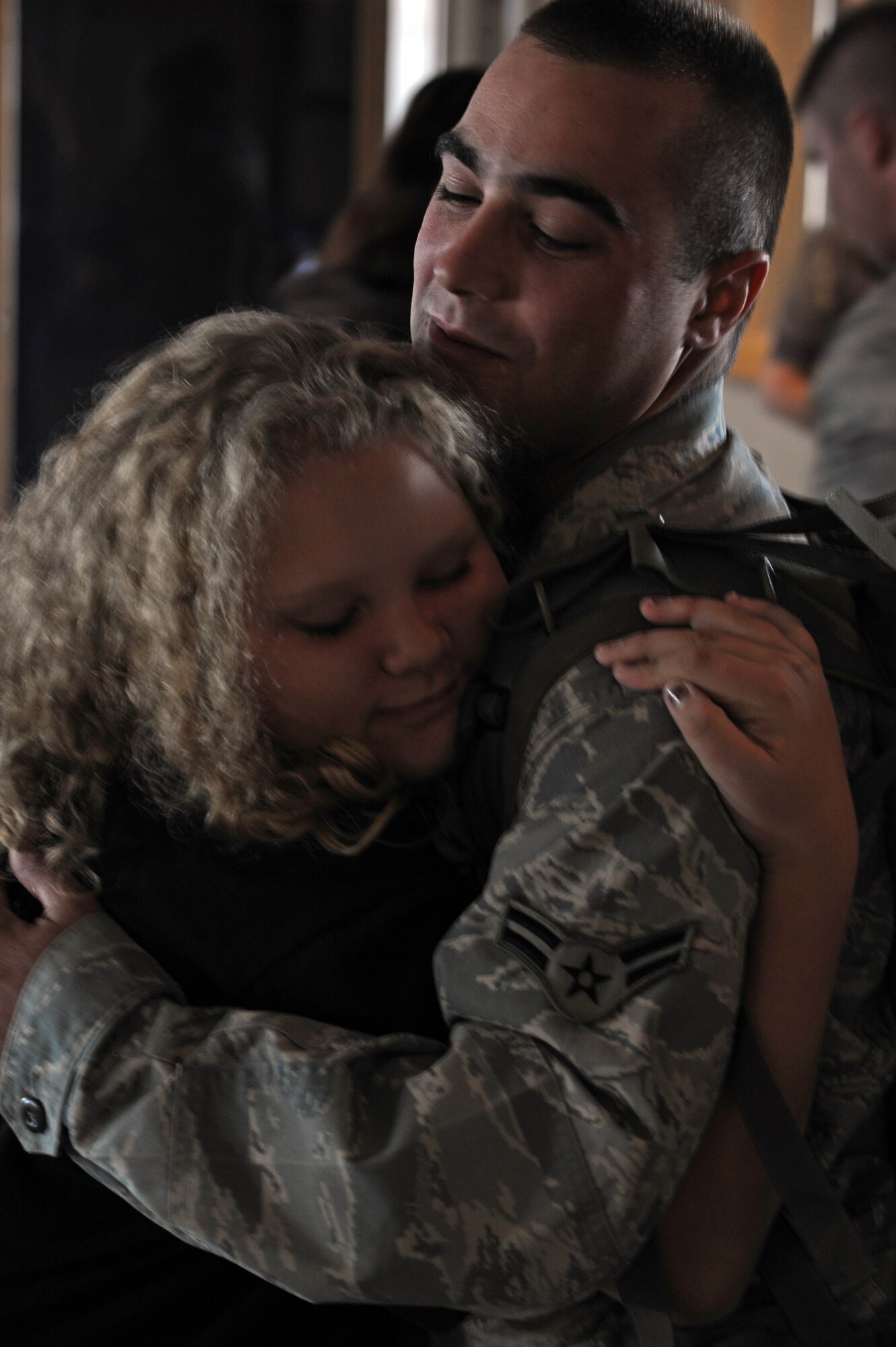 Airman 1st Class Christopher Rice, 28th Security Forces Squadron police officer, returns home from a six-month deployment to Southwest Asia, is welcomed by family and friends at Rapid City Regional Airport in Rapid City, S.D., Oct. 20. While serving in Southwest Asia, members of the 28 SFS provided rapid, decisive and sustainable mission support in various roles. (US Air Force Photo/Airman 1st Class Adam Grant)   