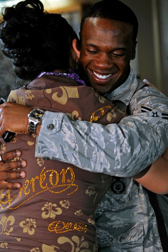 Airman 1st Class Mason Richard, 28th Security Forces Squadron police officer, is greeted by one of his friends at Rapid City Regional Airport, Rapid City, S.D., Oct. 20. Airman Dixon is one of 23 security forces Airmen returning from deployment to Southwest Asia. (U.S. Air Force photo/Airman Matthew Flynn)