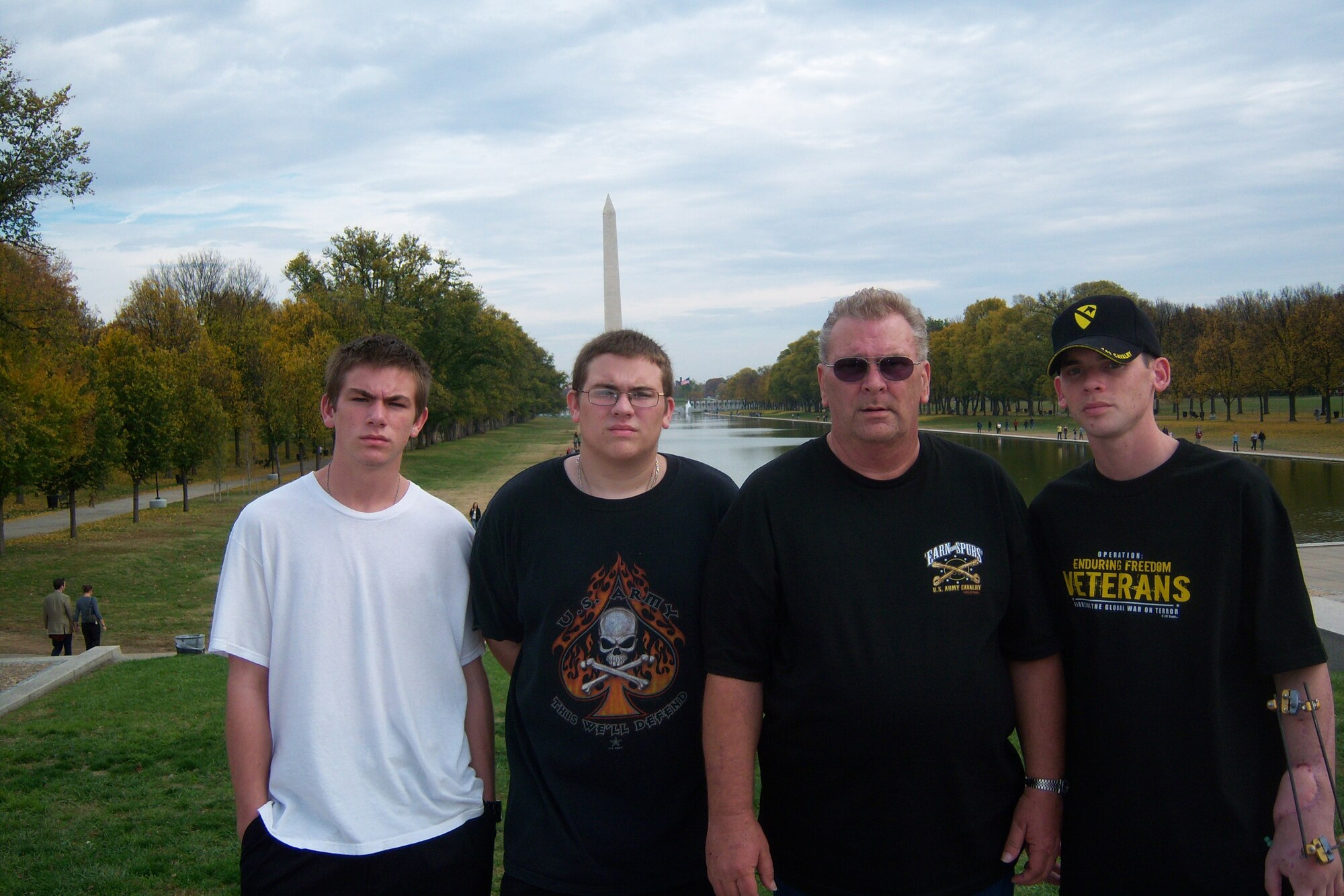 Army Spc. Kevin Hardin, far right, poses with his father, Charles, right, and brothers Kyle, left, and Keith, far left, in Washington, D.C. (Courtesy photo) 
