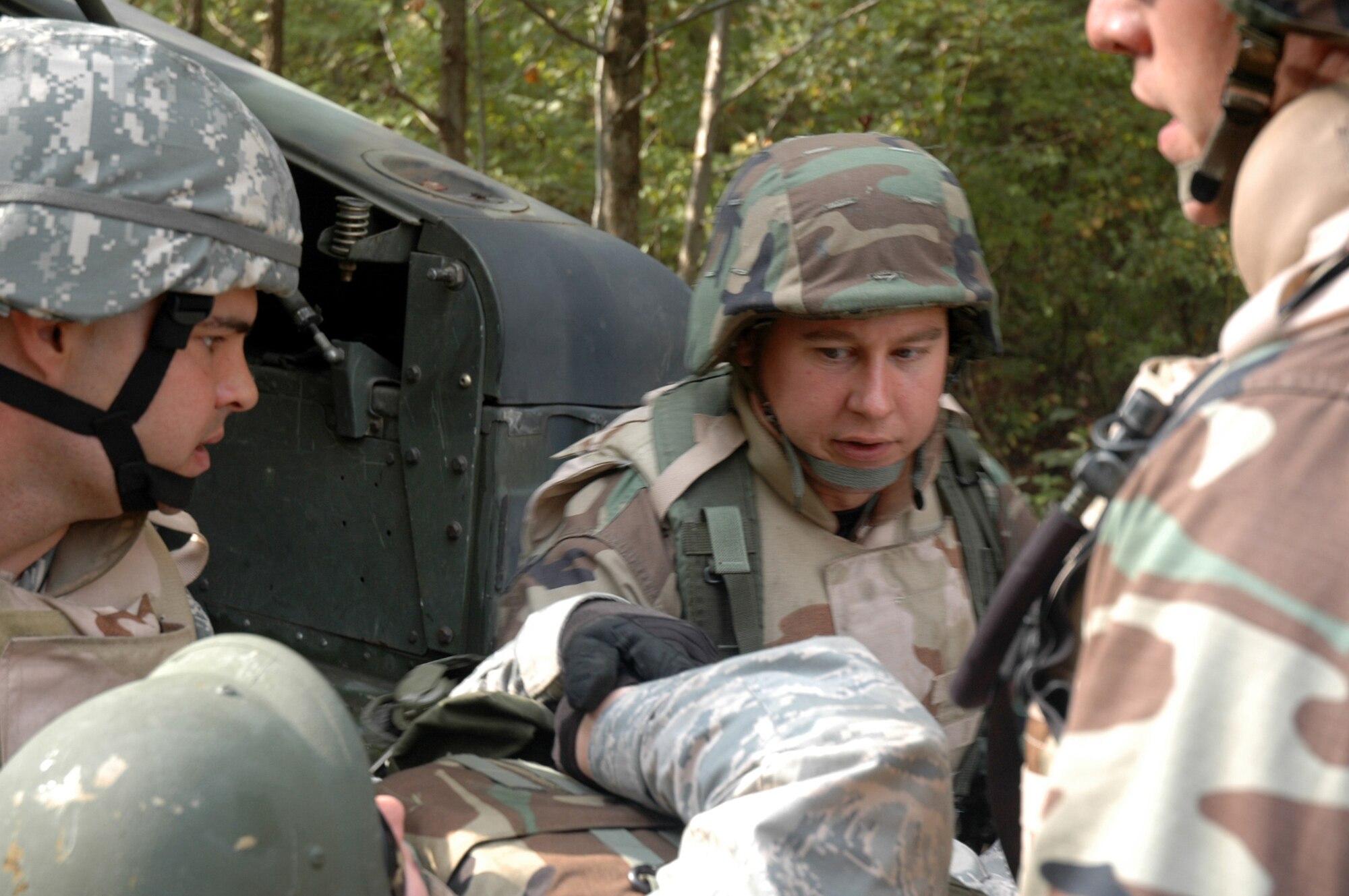 Students in the Advanced Contingency Skills Training Course 09-1 react to a scenario during convoy operations training on a Fort Dix, N.J., range Oct. 9, 2008.  ACST is taught by the U.S. Air Force Expeditionary Center's 421st Combat Training Squadron and prepares Airmen for upcoming deployments.  (U.S. Air Force Photo/Staff Sgt. Paul R. Evans)