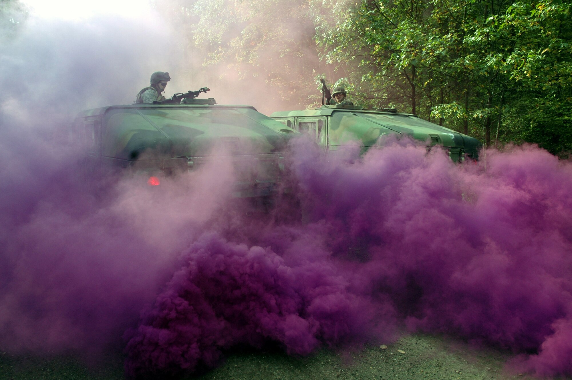 Students in the Advanced Contingency Skills Training Course 09-1 react to a scenario that simulates a burning vehicle during convoy operations training on a Fort Dix, N.J., range Oct. 9, 2008.  ACST is taught by the U.S. Air Force Expeditionary Center's 421st Combat Training Squadron and prepares Airmen for upcoming deployments.  (U.S. Air Force Photo/Staff Sgt. Paul R. Evans)