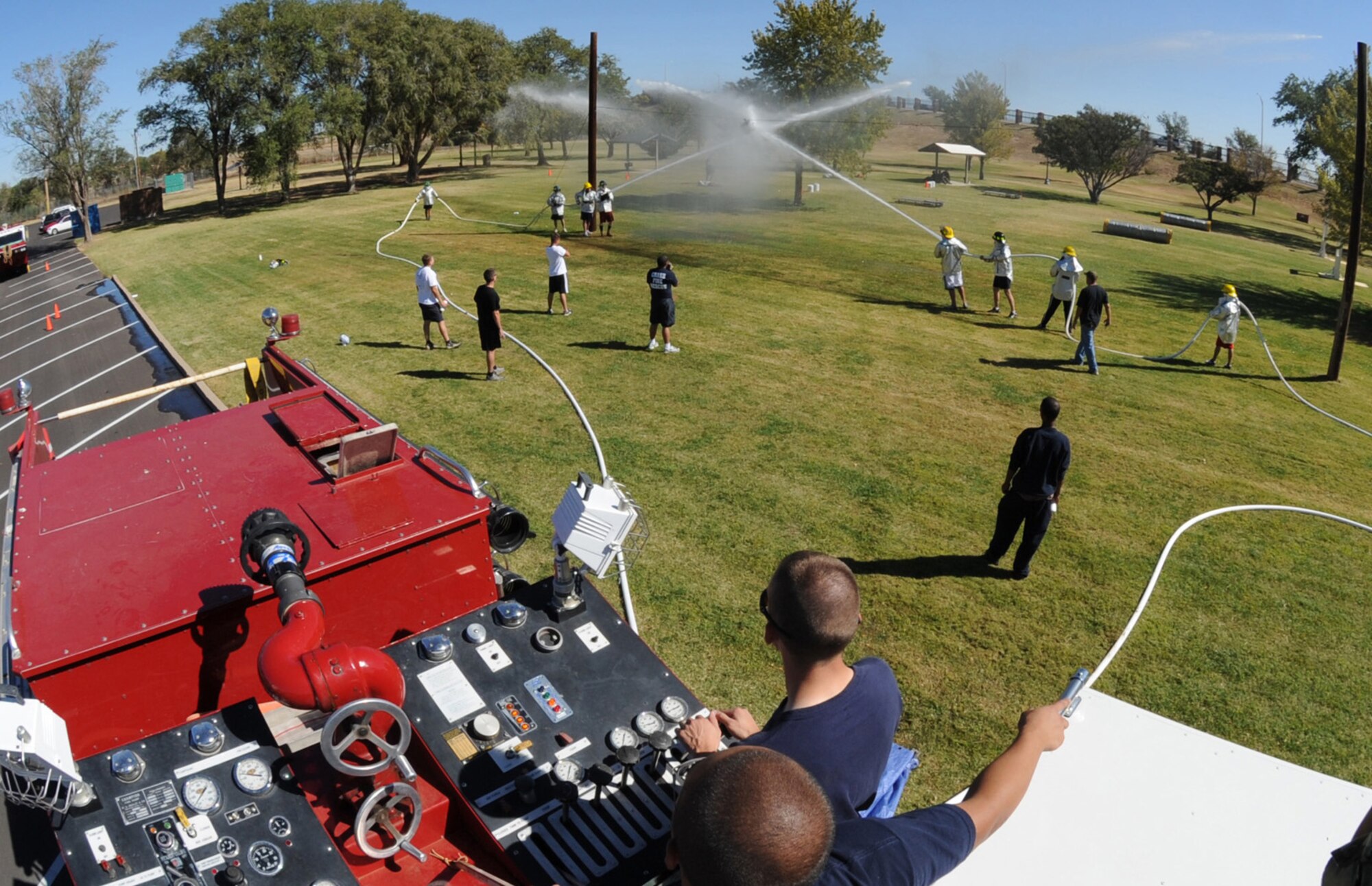 CANNON AIR FORCE BASE, N.M. -- Two teams compete in the waterball challenge at the Fire Muster during Fire Prevention Week. The muster concluded fire prevention week, which focused on fire prevention measures that should be taken throughout the year. (U.S. Air Force photo by Airman 1st Class Evelyn Chavez)
