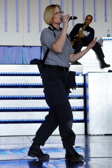 MOODY AIR FORCE BASE, Ga. – Tech. Sgt. Bridgett Johnson, Tops in Blue performer, rehearses before a show at Wild Adventures Theme Park Oct. 19. Sergeant Johnson is from the 71st Rescue Squadron. (U.S. Air Force photo by Airman Joshua Green)