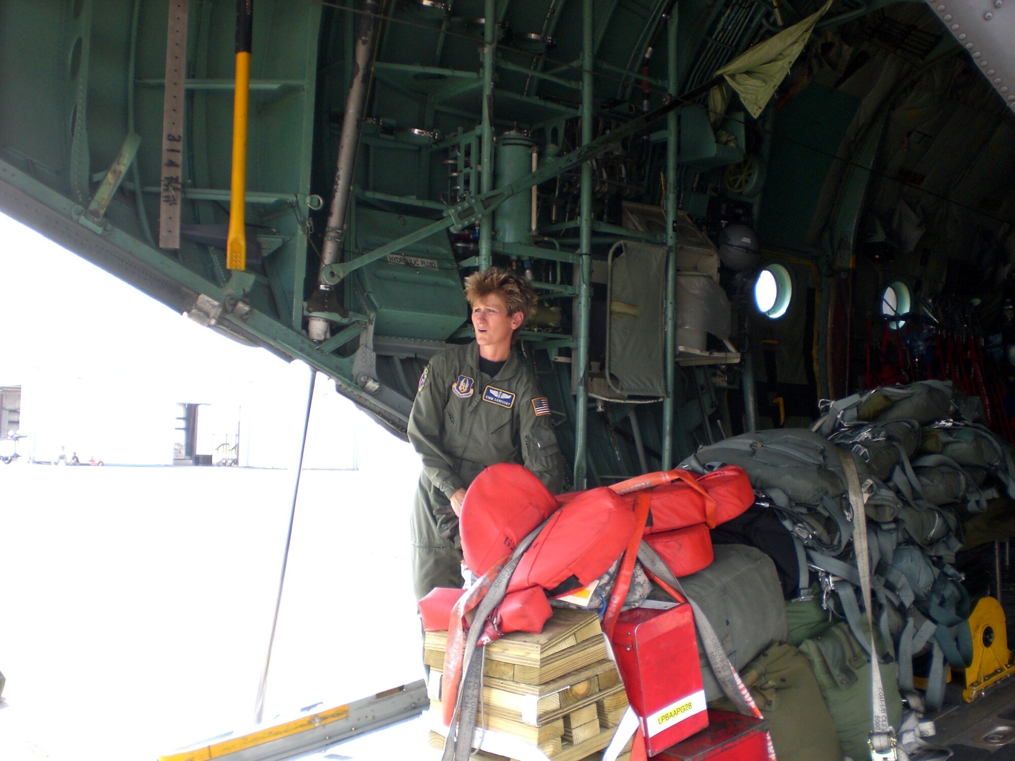 U.S. Air Force Maj. Kimm Sandusky, 445th Aeromedical Evacuation Squadron, prepares a C-130 aircraft to transport patients out of the path of Hurricane Gustav. (Courtesy photo)