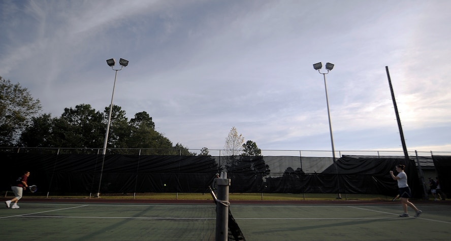 MOODY AIR FORCE BASE, Ga. – Georgeann Vigay, 23rd Logistics Readiness Squadron, and Senior Airman Sarah Cox, 23rd Medical Group, play a game of tennis Oct. 17 here. Tennis was one of many sporting events held during Super Sports Day. (U.S. Air Force photo by Senior Airman Brittany Barker)