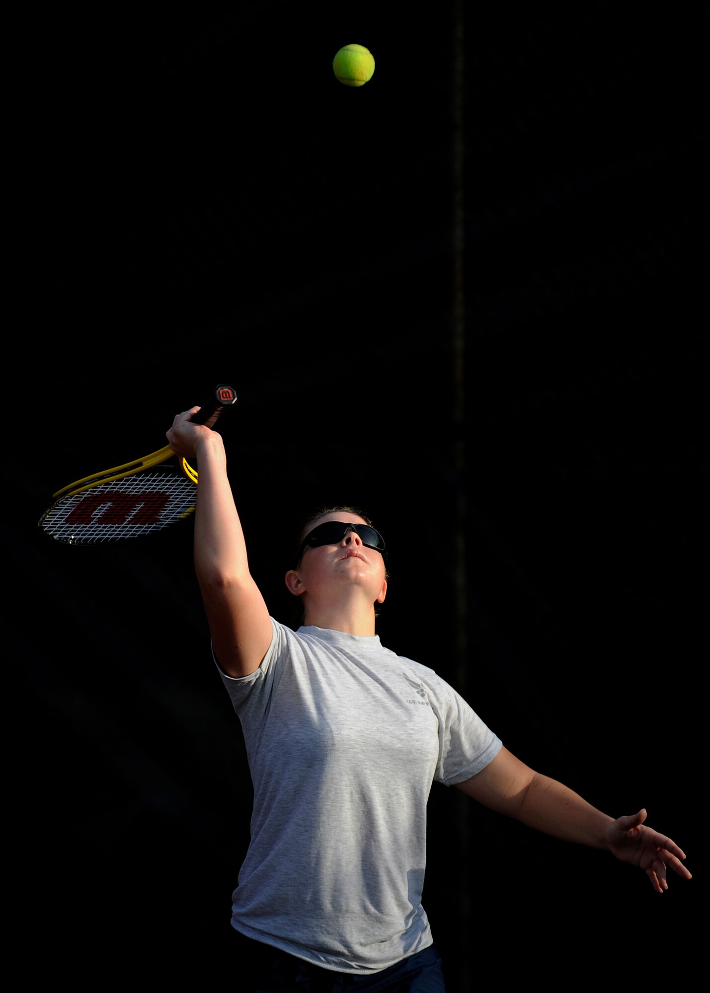 MOODY AIR FORCE BASE, Ga. – Senior Airman Sarah Cox, 23rd Medical Group, serves during a tennis match Oct. 17 here. All Team Moody members were invited to play in several sporting events during Super Sports Day. (U.S. Air Force photo by Senior Airman Brittany Barker)