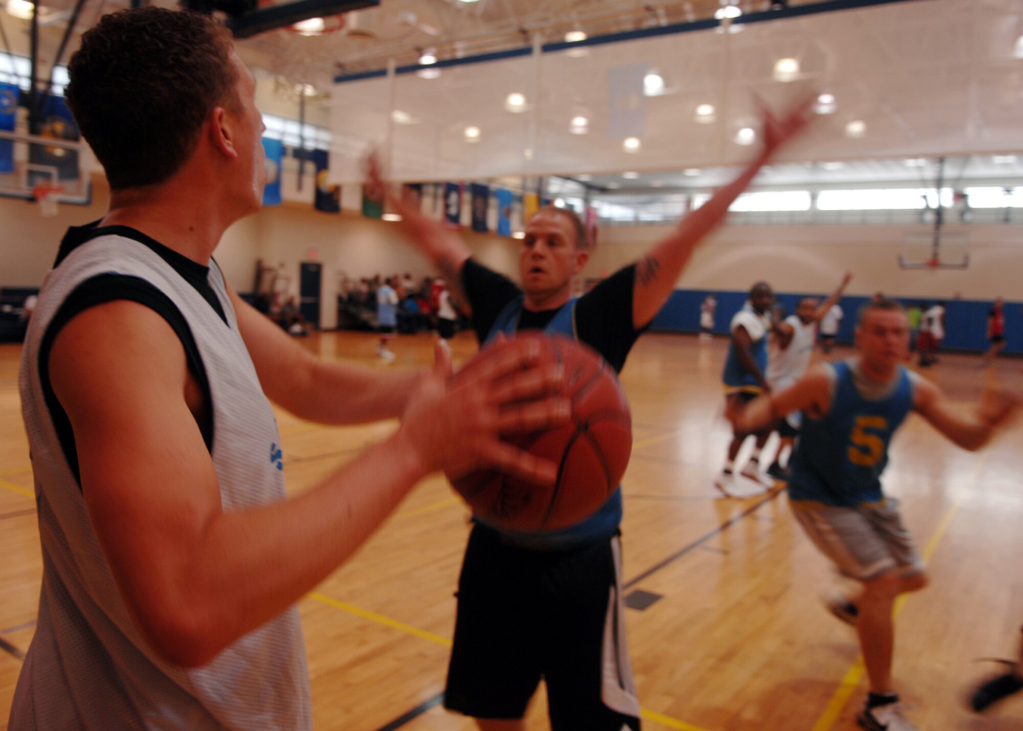 MOODY AIR FORCE BASE, Ga. – Airman 1st Class Thomas Spencer, 23rd Maintenance Operations Squadron, attempts an inbound pass Oct. 17 here. Airman Spencer played in a three-on-three basketball tournament during Super Sports Day. (U.S. Air Force photo by Airman Joshua Green)  