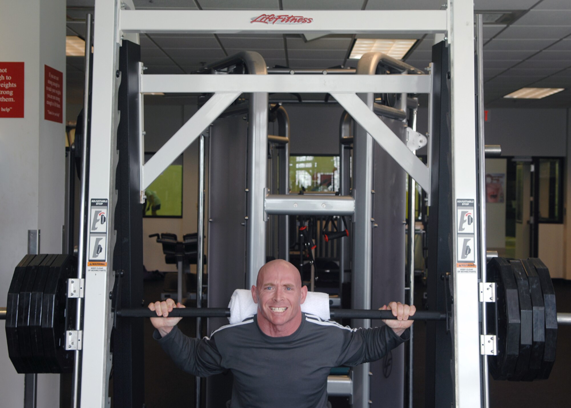 MOODY AIR FORCE BASE, Ga. – Tech. Sgt. Jason Johnson, 23rd Force Support Squadron, performs a squat lift Oct. 17 here. Sergeant Johnson participated in the weight lifting competition during Super Sports Day. (U.S. Air Force photo by Airman Joshua Green)