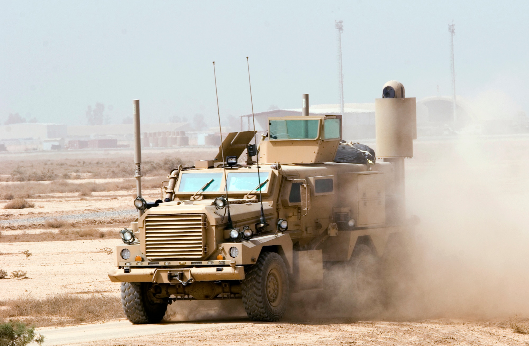 A Mine Resistant Ambush Protected, or MRAP, vehicle drives toward a taxiway Oct. 2 at Joint Base Balad, Iraq.  Airmen in the 532nd Expeditionary Security Forces Squadron's Quick Response Force will use MRAPs as part of their mission to defend the base both inside and outside the perimeter, a mission not conducted by the Air Force since the Vietnam War.  (U.S. Air Force photo/Tech. Sgt. Erik Gudmundson) 