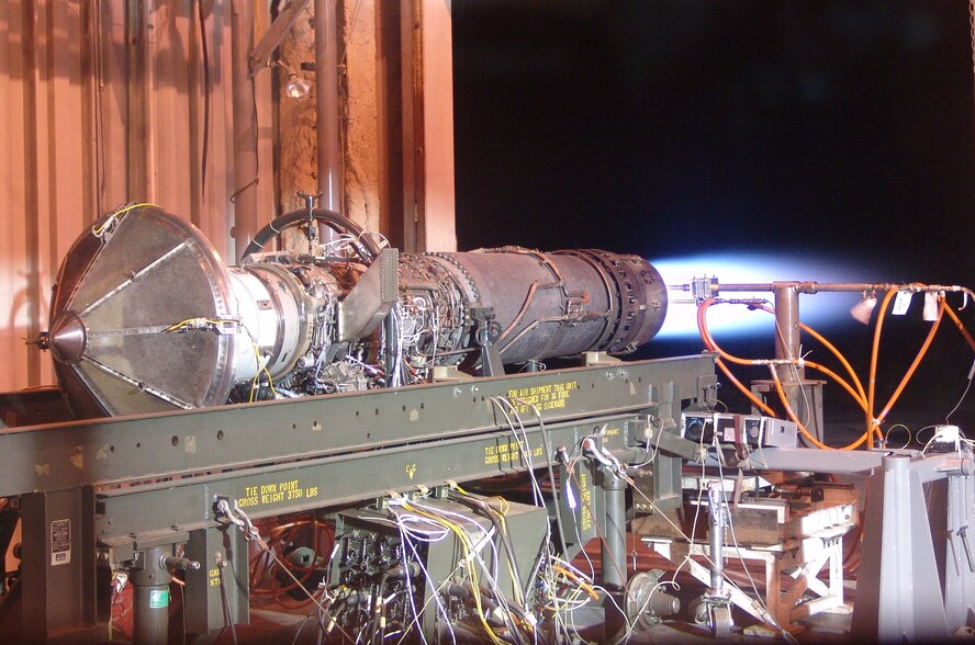 A J85 afterburning turbine engine is seen here operating at a maximum thrust conditions on a test stand at UTSI’s Propulsion Research Facility. The engine is being used to evaluate and validate new test techniques and technologies for near-term use in ground testing on the engines powering the F-22A Raptor and the F-35 Lightning II Join Strike Fighter at Arnold. The J85 is the power plant for the T-38 Talon, an American supersonic jet trainer used by the U.S. Air Force and a host of other countries. (Photo provided)
