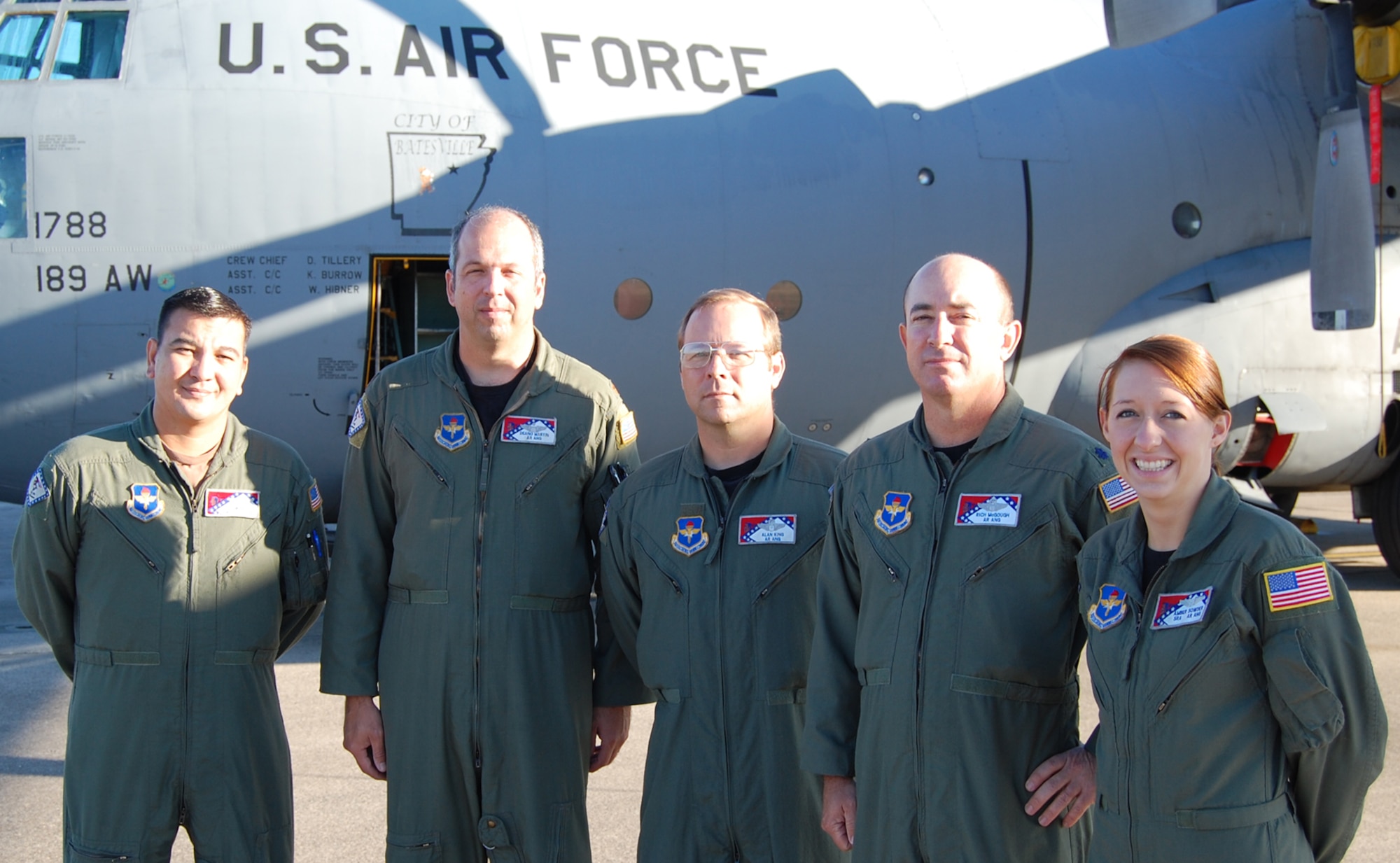 The crew of Props 76: (from left) Master Sgt. Doug McGroarty, flight engineer, Maj. Deano Martin, pilot; Lt. Col. Alan King, navigator; Lt. Col. Rich McGough, co-pilot; and Senior Airman Amber Sowder, loadmaster. (Photo by Lt. Col. Dom Sarnataro)