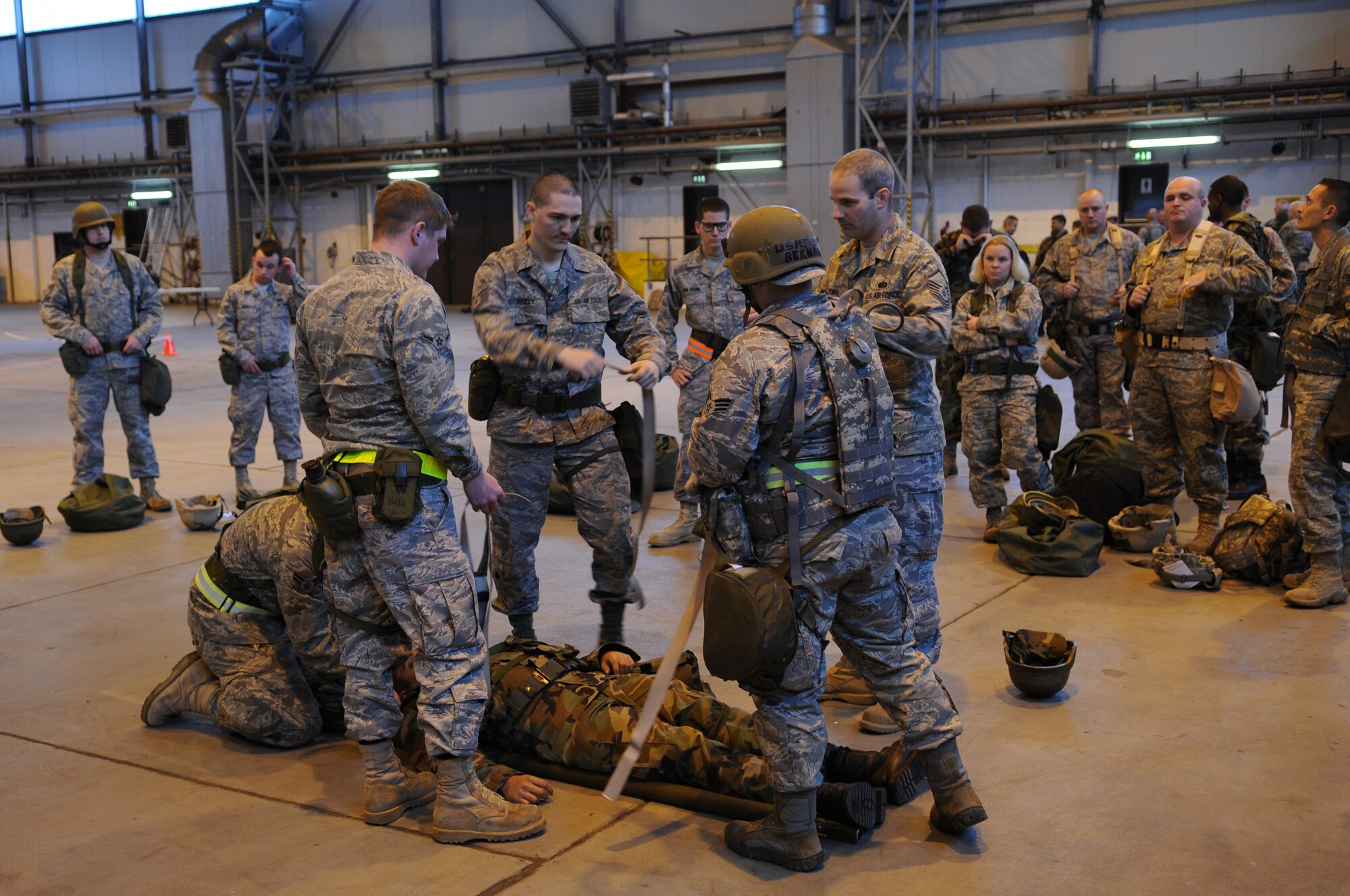 Air Force members practice Self Aid Buddy care during the Warrior Prep day training, Ramstein Air Base, Germany, Oct. 17, 2008. The training is to enhance their ability to support the mission while on base or while being deployed. (U.S. Air Force photo by Airman 1st Class Caleb Pierce)(Released)