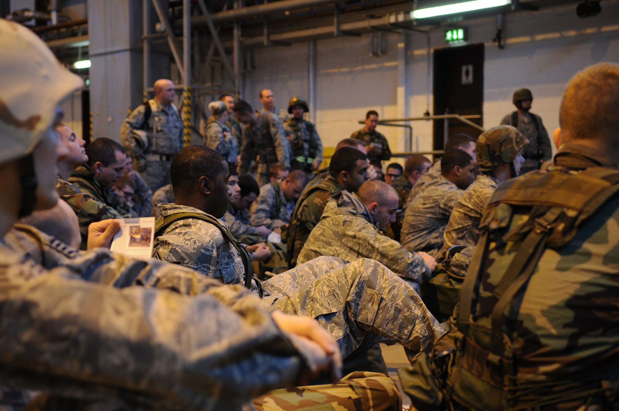 Air Force members sit through a briefing during the warrior prep day to enhance their ability to support the mission while on base or while being deployed, Ramstein Air Base, Germany, Oct. 17, 2008. (U.S. Air Force photo by Airman 1st Class Caleb Pierce)(Released)