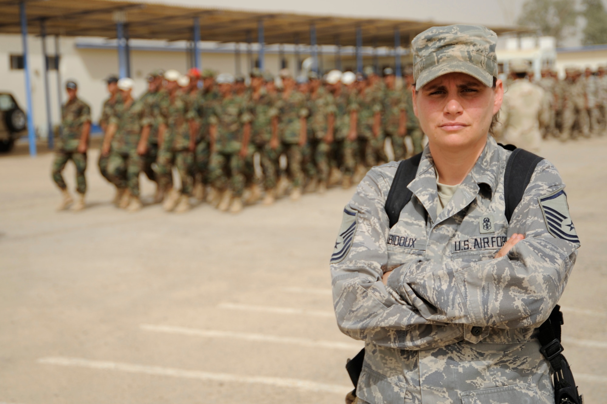 AL TAJI AIR BASE, Iraq -- U.S. Air Force Master Sgt. Jennifer Rabidoux, basic military training superintendent, 370th Expeditionary Training Squadron, poses for a photo during a parade practice at Al Taji Air Base, Iraq on Sept. 27. Rabidoux, a Bayonne, N.J. native, is deployed from the 320th Training Squadron, Lackland Air Force Base, Texas. (U.S. Air Force photo/Staff Sgt. Paul Villanueva II)