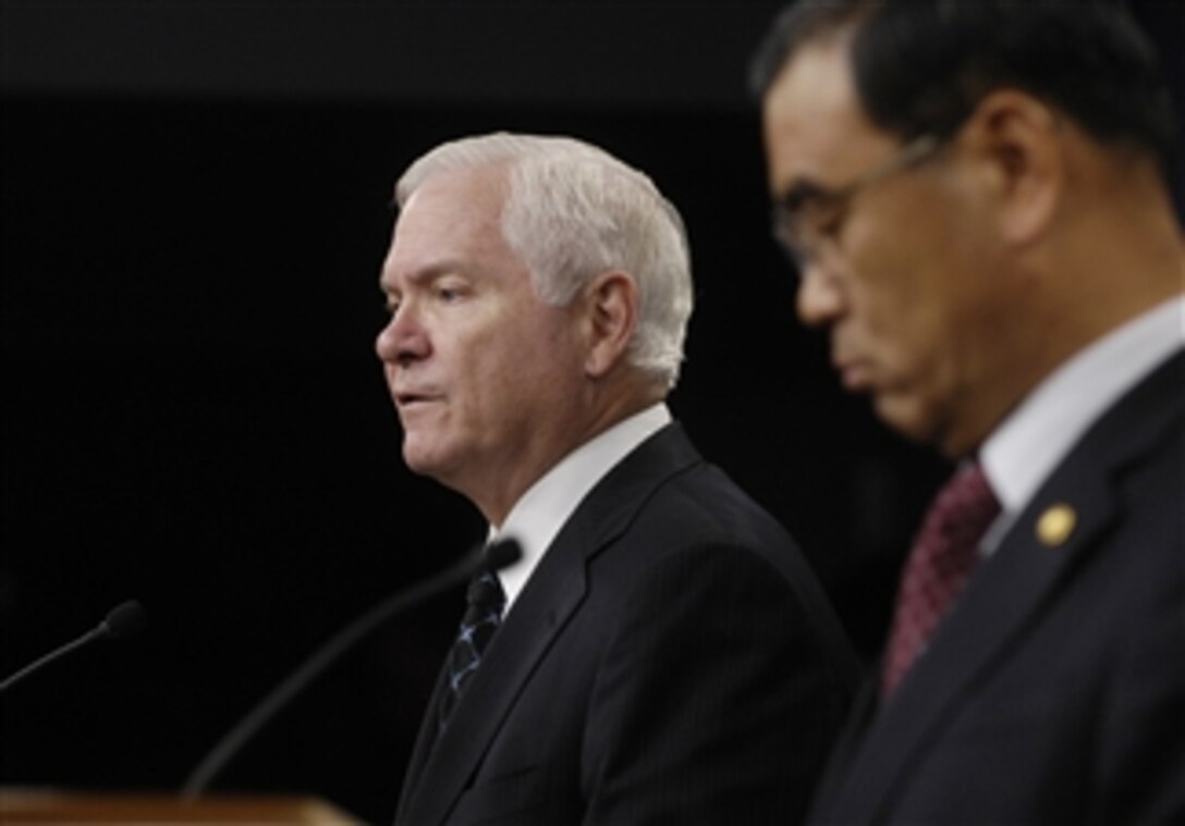Secretary of Defense Robert M. Gates (left) and South Korean Minister of National Defense Lee Sang-Hee answer questions from reporters during a press briefing in the Pentagon on Oct. 17, 2008.  