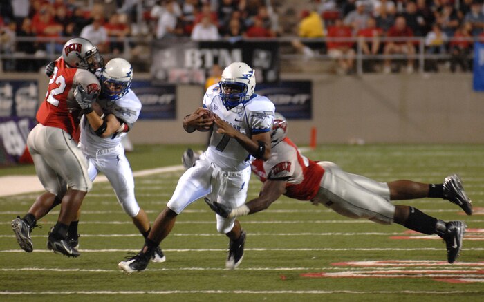 Air Force Falcons quarterback Tim Jefferson, eludes a defender for extra yards during the showdown against the University of Nevada Las Vegas Rebels, at Sam Boyd stadium Las Vegas, Nev. Oct. 18, 2008. The Falcons defeated the Rebels 29-28 and improved to 5-2 on the season and 3-1 in the Mountain West Conference.
(U.S. Air Force Photo/Senior Airman Larry E. Reid Jr.)