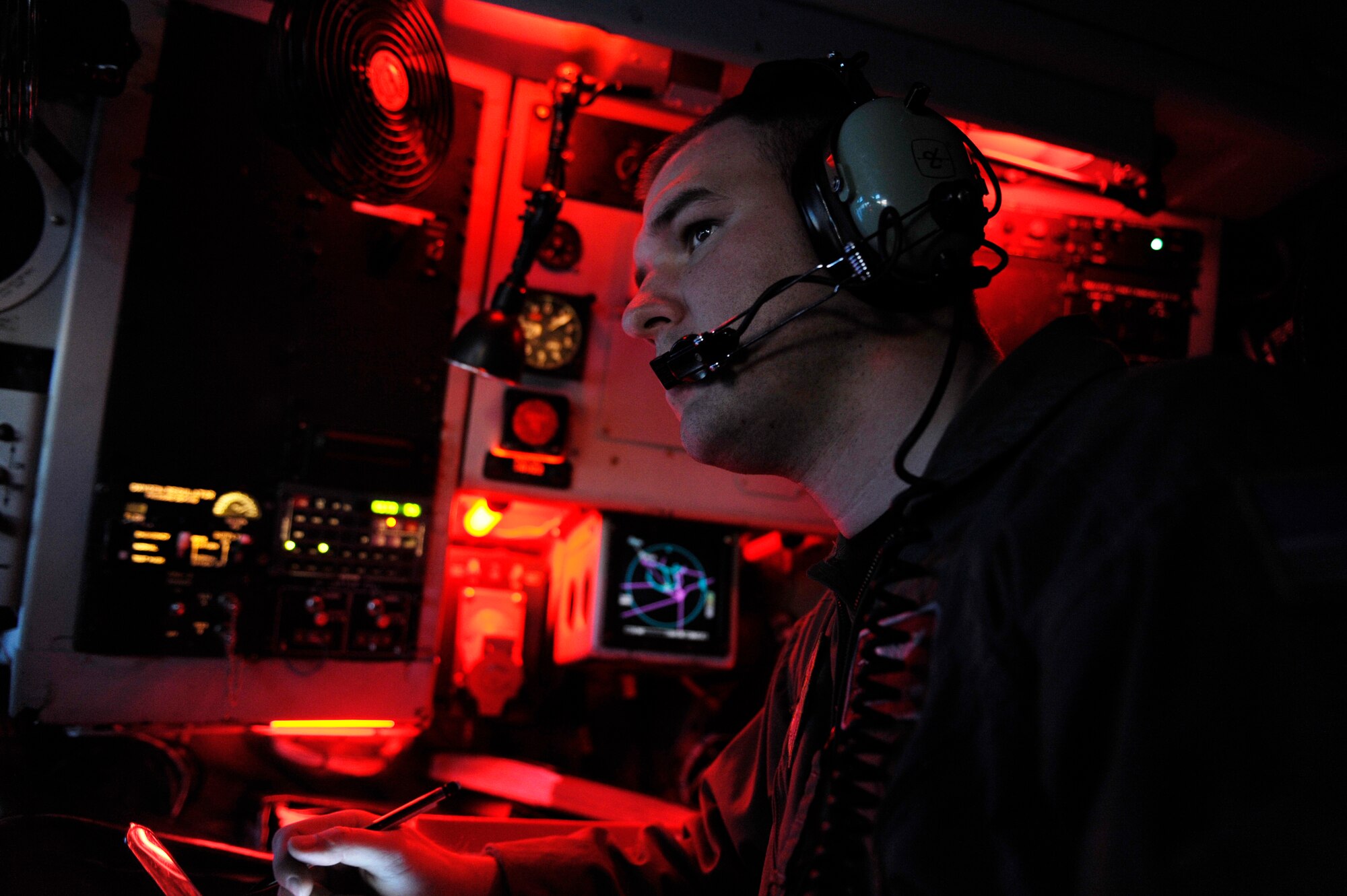 Senior Airman Parker McElroy logs the refueling mission information after he finished aerial refueling a B-52 Stratofortress during RED FLAG-Alaska 09-1 Oct. 16, 2008, at Eielson Air Force Base, Alaska. B-52s flew a 23 hour long endurance mission from Anderson Air Base, Guam and an 18 hour flight from Barksdale Air Force Base, La. The B-52 is assigned to the 96th Bomb Squadron at Barksdale. Airman McElroy is assigned to the 384th Air Refueling Squadron, McConnell Air Force Base, Kan.  (U.S. Air Force photo/Senior Airman Jonathan Snyder)