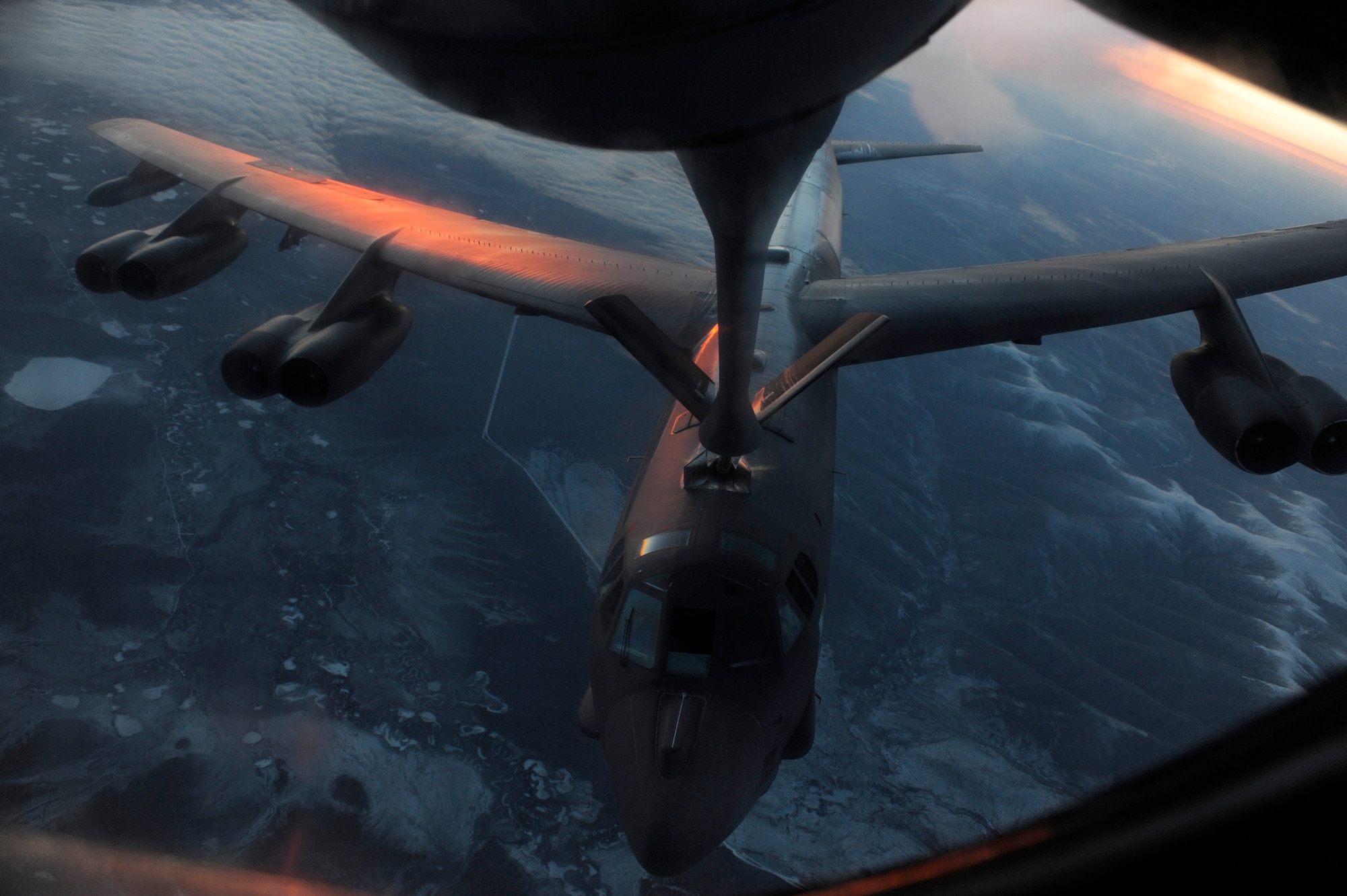 A B-52 Stratofortress is being aerial refueled at 27,000 feet during RED FLAG-Alaska 09-1 Oct. 16, 2008, at Eielson Air Force Base, Alaska. B-52s flew a 23 hour long endurance mission from Anderson Air Base, Guam and an 18 hour flight from Barksdale Air Force Base, La. B-52 is assigned to the 96th Bomb Squadron at Barksdale.  (U.S. Air Force photo/Senior Airman Jonathan Snyder)