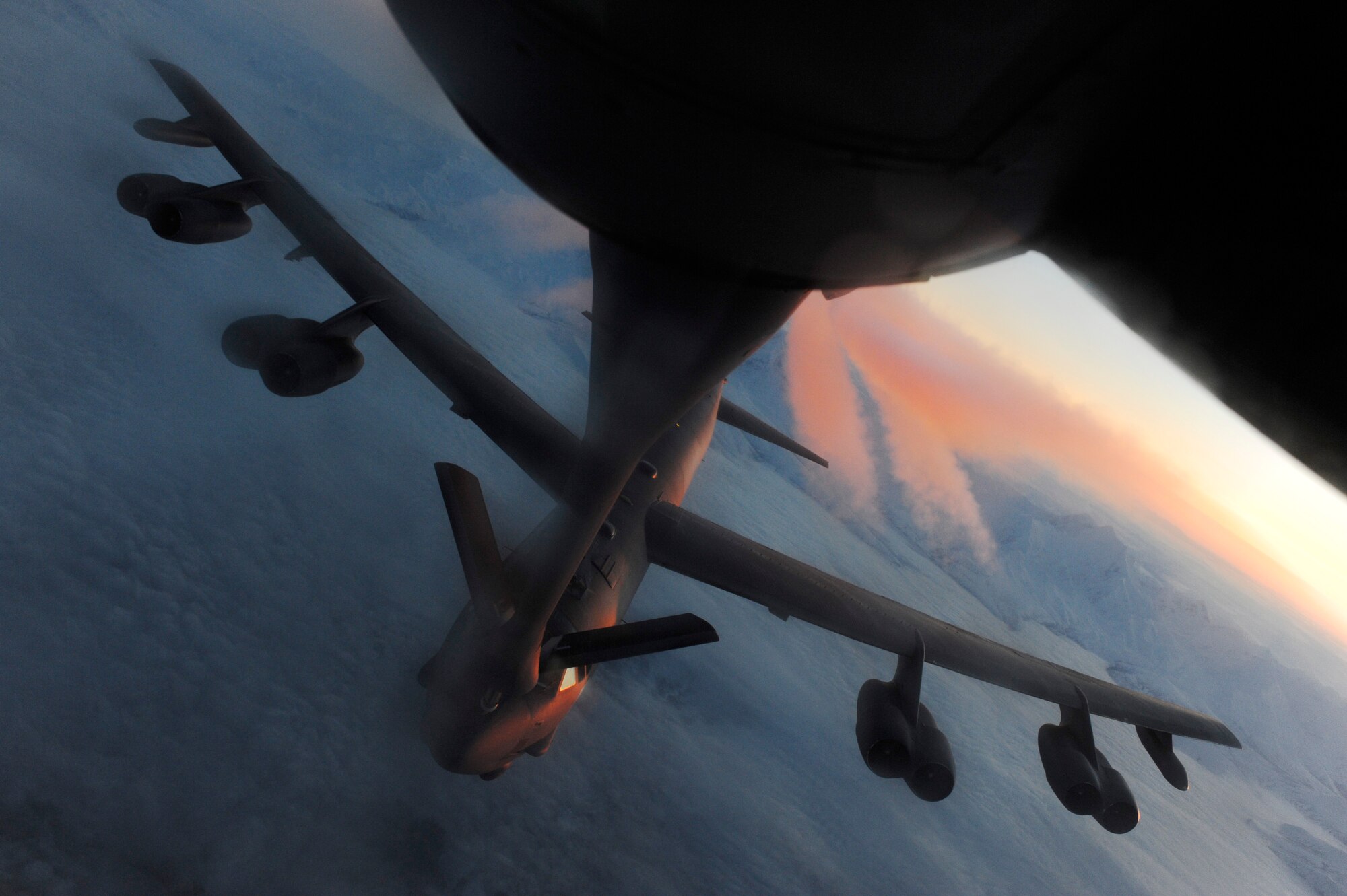 A B-52 Stratofortress sits in pre-contact position at 27,000 feet to be aerial refueled during RED FLAG-Alaska 09-1 Oct. 16, 2008, at Eielson Air Force Base, Alaska. B-52s flew a 23 hour long endurance mission from Anderson Air Base, Guam and an 18 hour flight from Barksdale Air Force Base, La. The B-52 is assigned to the 96th Bomb Squadron at Barksdale.  (U.S. Air Force photo/Senior Airman Jonathan Snyder)