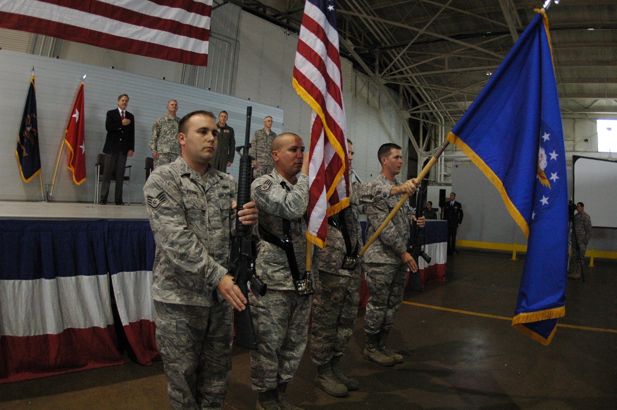 MINOT AIR FORCE BASE, N.D. – Airmen from the newly activated 219th Security Forces Squadron present the colors during the squadron activation ceremony here Oct. 18. The 219th SFS consists of North Dakota Air National Guard members. It is the first squadron in the Air National Guard whose mission is to support missile security for the 91st Missile Wing. Once fully staffed, the 219th SFS will be the largest security forces squadron in the ANG. (DoD photo by Senior Master Sgt. David H. Lipp)