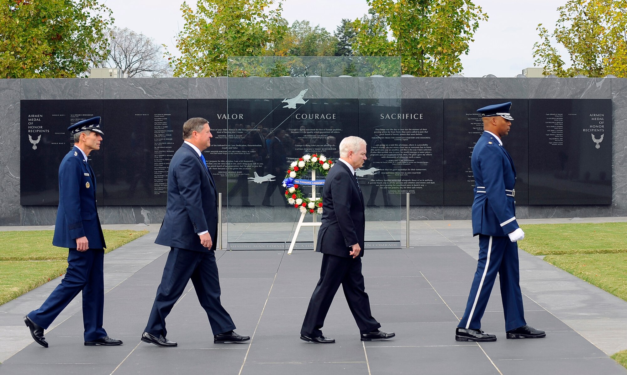 U.S. Defense Secretary Robert M. Gates walks with Secretary of the Air Force Michael B. Donley and Air Force Chief of Staff Norton A. Schwartz prior to Secretary Donley's swearing in by Secretary Gates at the Air Force Memorial in Arlington, Va., Oct. 17. (Department of Defense photo/Tech. Sgt. Jerry Morrison)
