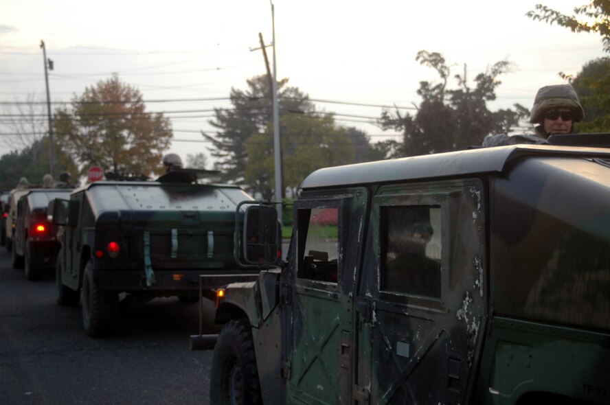 Security forces Airmen at the U.S. Air Force Expeditionary Center for training are lined up in high-mobility, multi-wheeled vehicles, or HMMWVs, Oct. 16, 2008, prior to departing for field training on a Fort Dix, N.J., range.  (U.S. Air Force Photo/Tech. Sgt. Scott T. Sturkol)