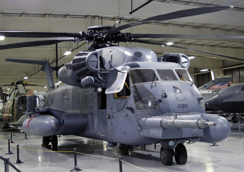 The MH-53 helicopters were originally HH-53 "Super Jolly Green Giants" used by the U.S. Air Force in the Southeast Asia War. Over the years, however, they received many upgrades and improvements. After the 1960s, they were completely re-skinned and had their engines and rotors replaced. Along with these improvements came a new designation, MH-53 ("M" for Multi-mission and "H" for helicopter). 
