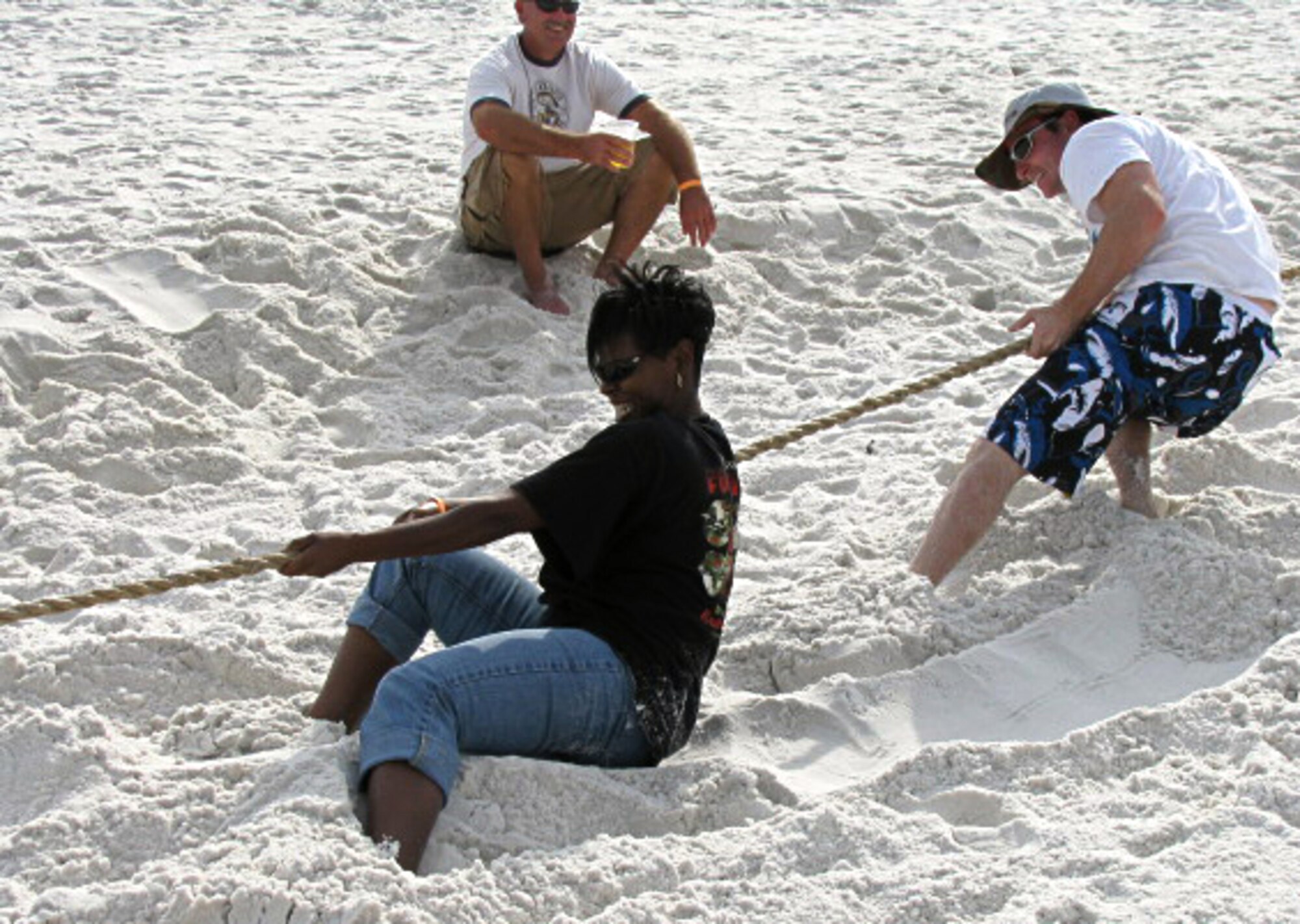 EGLIN AIR FORCE BASE, Fla. -- Members of the 46th Test Wing celebrate the end of summer with a fish fry and beach party on Okaloosa Island Oct. 17. More than 1,300 people gathered for the event. (U.S. Air Force photo by Irene Freiberg)