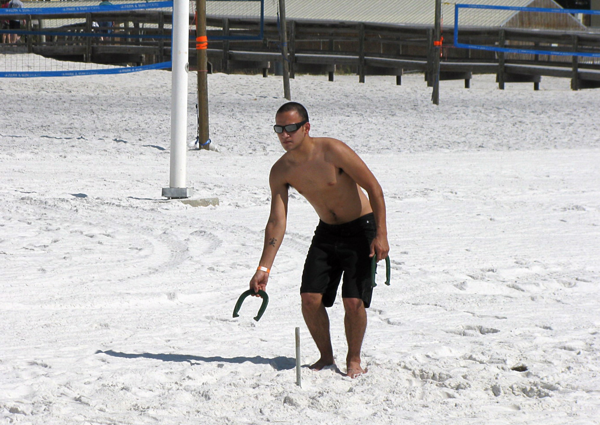 EGLIN AIR FORCE BASE, Fla. -- Members of the 46th Test Wing celebrate the end of summer with a fish fry and beach party on Okaloosa Island Oct. 17. More than 1,300 people gathered for the event. (U.S. Air Force photo by Irene Freiberg)
