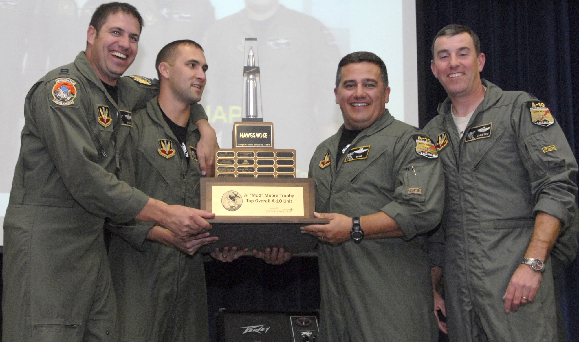 The Hawgsmoke 2008 team from the 190th Fighter Squadron, Idaho Air National Guard, accept the trophy for the top team Oct. 17 in Salina, Kan.  From left, Capt. Ben Rhoades, 1st Lt. Ryan Brown, Lt. Col. Tony Brown and Lt. Col. Ron Hedges, were crowned Hawgsmoke champions after four days of competition among teams from 14 Air Force A-10 squadrons.  (U.S. Air Force photo/Maj. David Kurle)