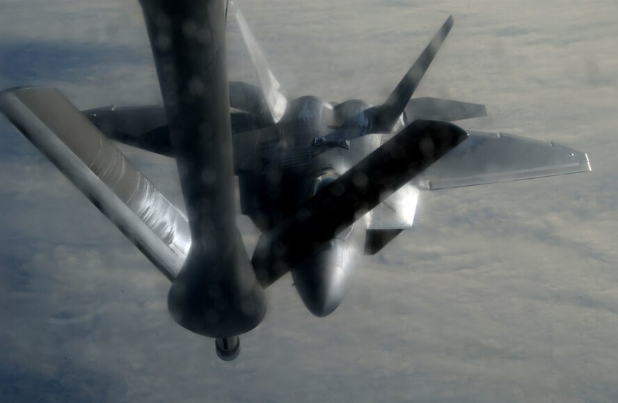 An F-22 Raptor approaches a KC-135 Stratotanker for a refuel mission Oct. 17 at Eielson Air Force Base, Alaska during RED FLAG Alaska 09-1. Red Flag-Alaska is a Pacific Air Forces-directed field training exercise for U.S. forces flown under simulated air combat conditions. It is conducted on the Pacific Alaskan Range Complex with air operations flown out of Eielson and Elmendorf Air Force Bases.  (U.S. Air Force photo Airman Laura Max)