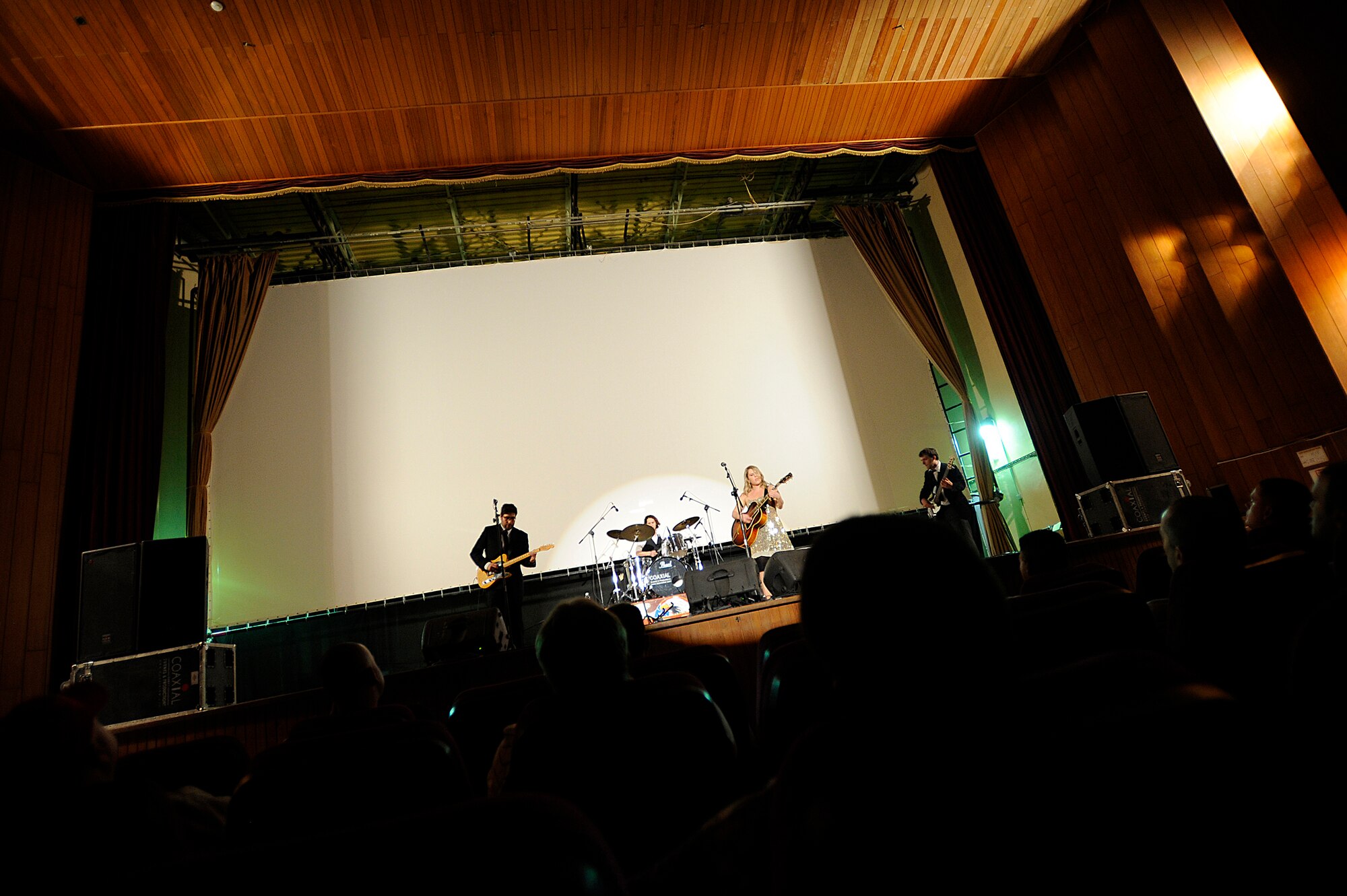 Nell Bryden, a jazz/bluegrass artist, performs for servicemembers at Joint Base Balad, Iraq, Oct. 19. Bryden's performance was part of an Armed Forces Entertainment tour of the U.S. Central Command area of responsibility. Armed Forces Entertainment hosts more than 1,200 shows around the world each year. (U.S. Air Force photo/Airman 1st Class Jason Epley)