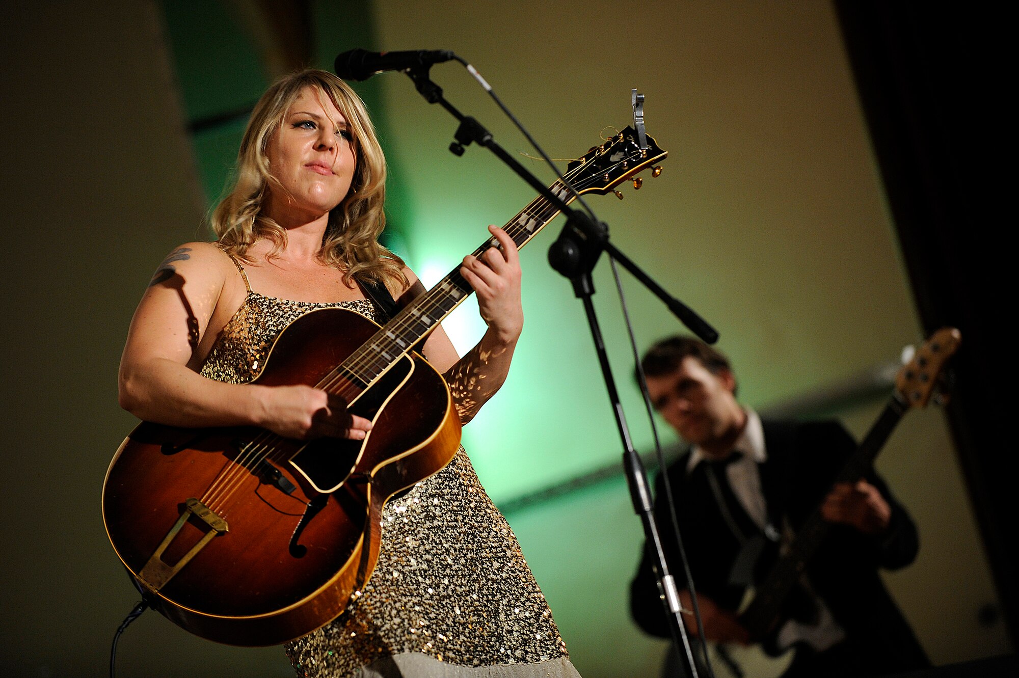 Nell Bryden, a jazz/bluegrass artist, performs at Joint Base Balad, Iraq, Oct. 19. Bryden's performance was part of an Armed Forces Entertainment tour of the U.S. Central Command area of responsibility. Armed Forces Entertainment hosts more than 1,200 shows around the world each year. (U.S. Air Force photo/Airman 1st Class Jason Epley)