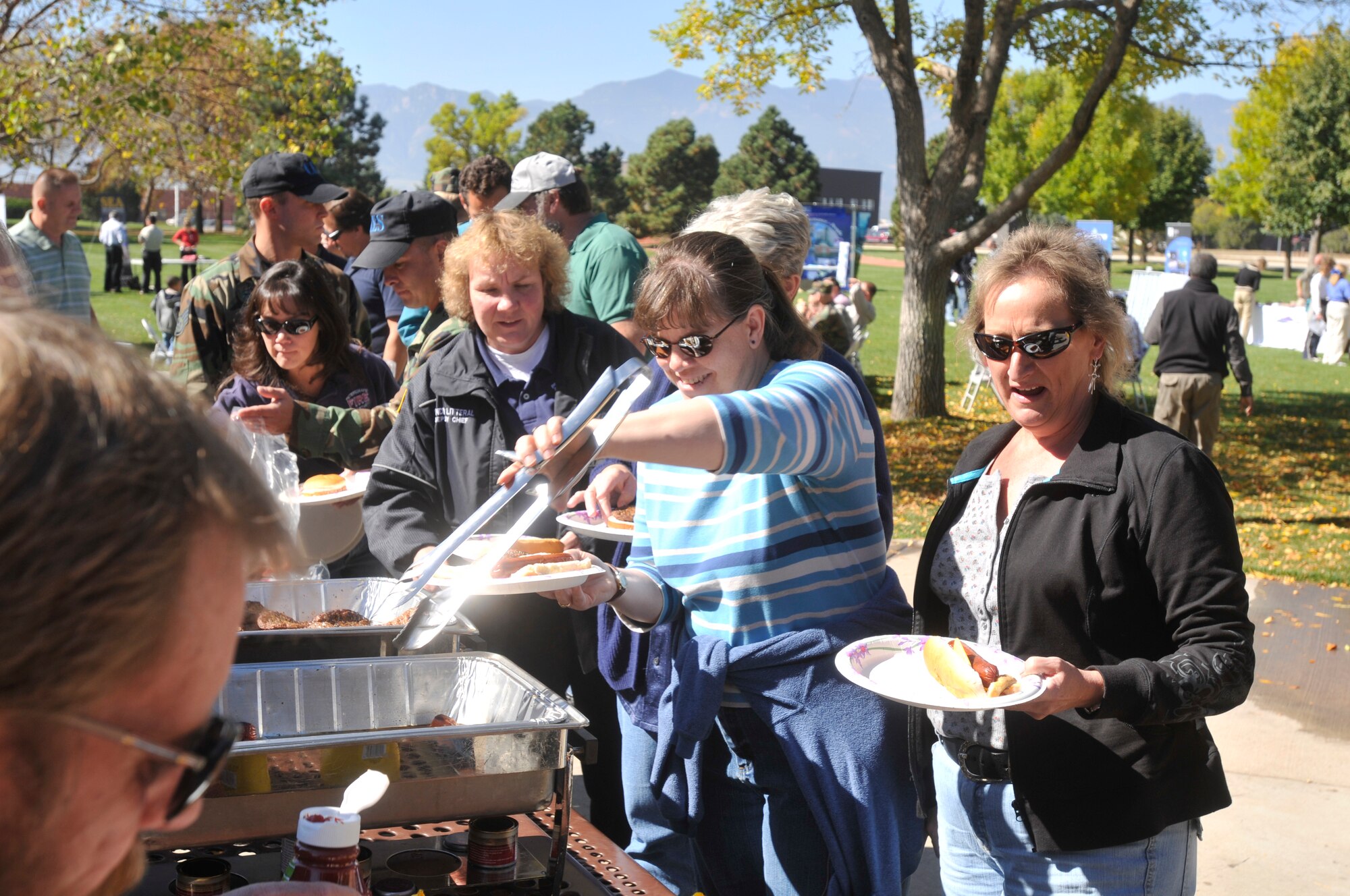 21st Space Wing members join together for food, fun and energy awareness at Energy Awareness Month Bar B Que at  Eagle Park. This picnic is trying to raise awareness of energy conservation.

October is Air Force Energy Awareness Month and like the many dedicated months of the year, October is be filled with a myriad of informational events. But more than the picnics, the 5K awareness runs, the free light bulbs, and fun events, Energy Awareness Month is first and foremost an educational process. Knowing the problem is often the first step to solving it. (Air Force Photo/Larry Hulst)
