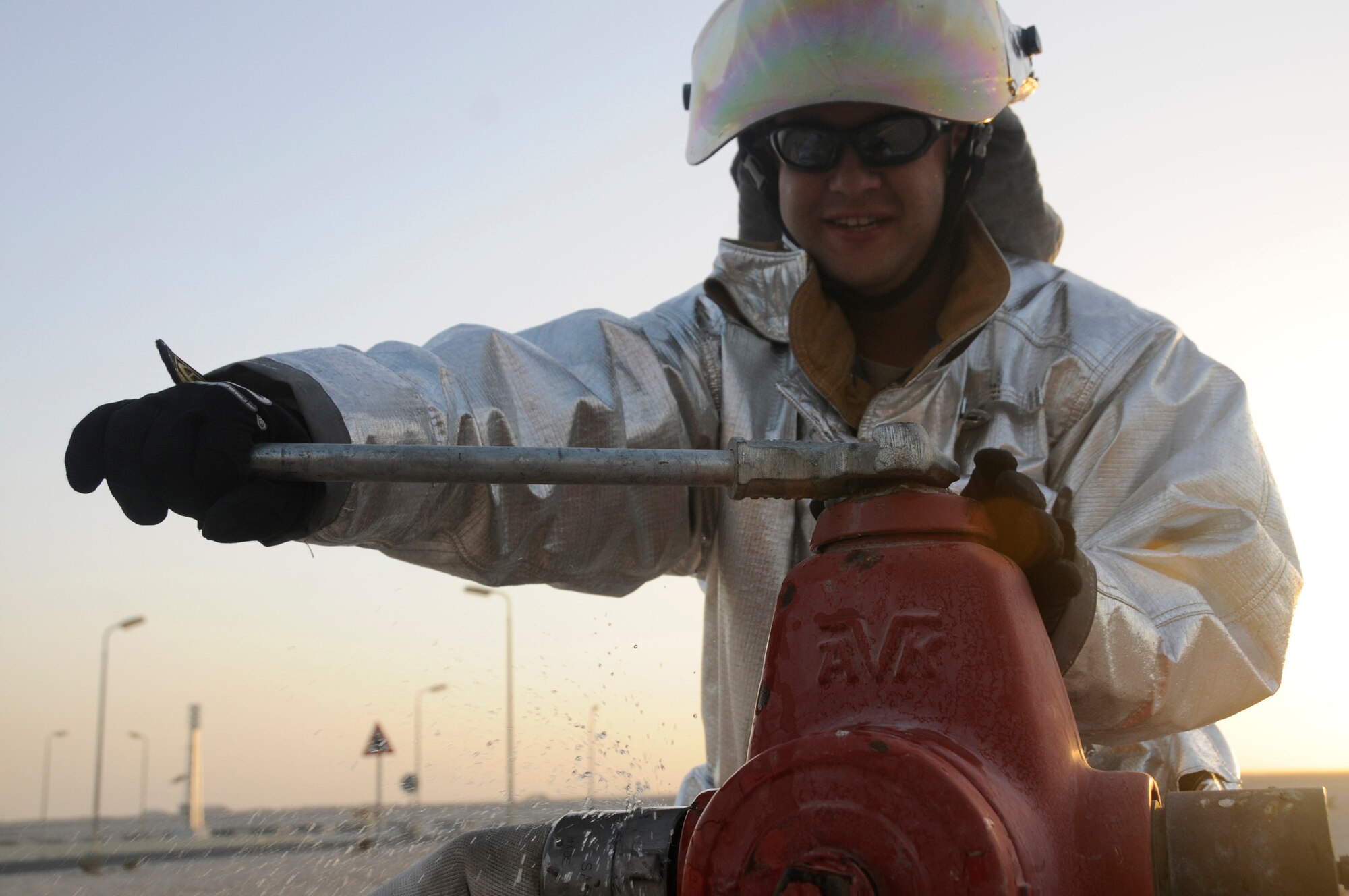 Staff Sgt. Anthony Altomare, fire emergency services crew chief assigned to the 379th Expeditionary Civil Engineer Squadron, uses a hydro wrench to reservice a P-19 crash truck Oct. 20, 2008, at an undisclosed air base in Southwest Asia.  Sergeant Altomare, a native of Lisbon, Ohio, is deployed from Tyndall Air Force Base, Fla., in support of Operations Iraqi and Enduring Freedom and Joint Task Force-Horn of Africa. (U.S. Air Force photo by Staff Sgt. Darnell T. Cannady/Released)