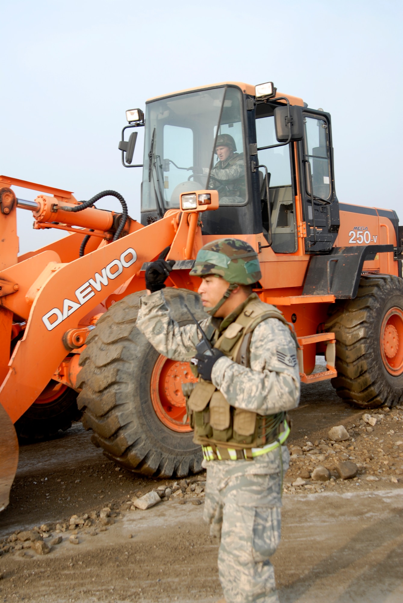 Staff Sgt. Jacob Membreno, 8th Civil Engineer Squadron, acts as Crater Chief during a joint USAF/Republic of Korean Air Forces airfield management training at Kunsan Air Base, Republic of Korea, October 21, 2008. The Crater Chief coordinates all of the assets necessary to complete the job of filling in a crater on the airfield. (U.S. Air Force photo/Staff Sgt. Jason Colbert)